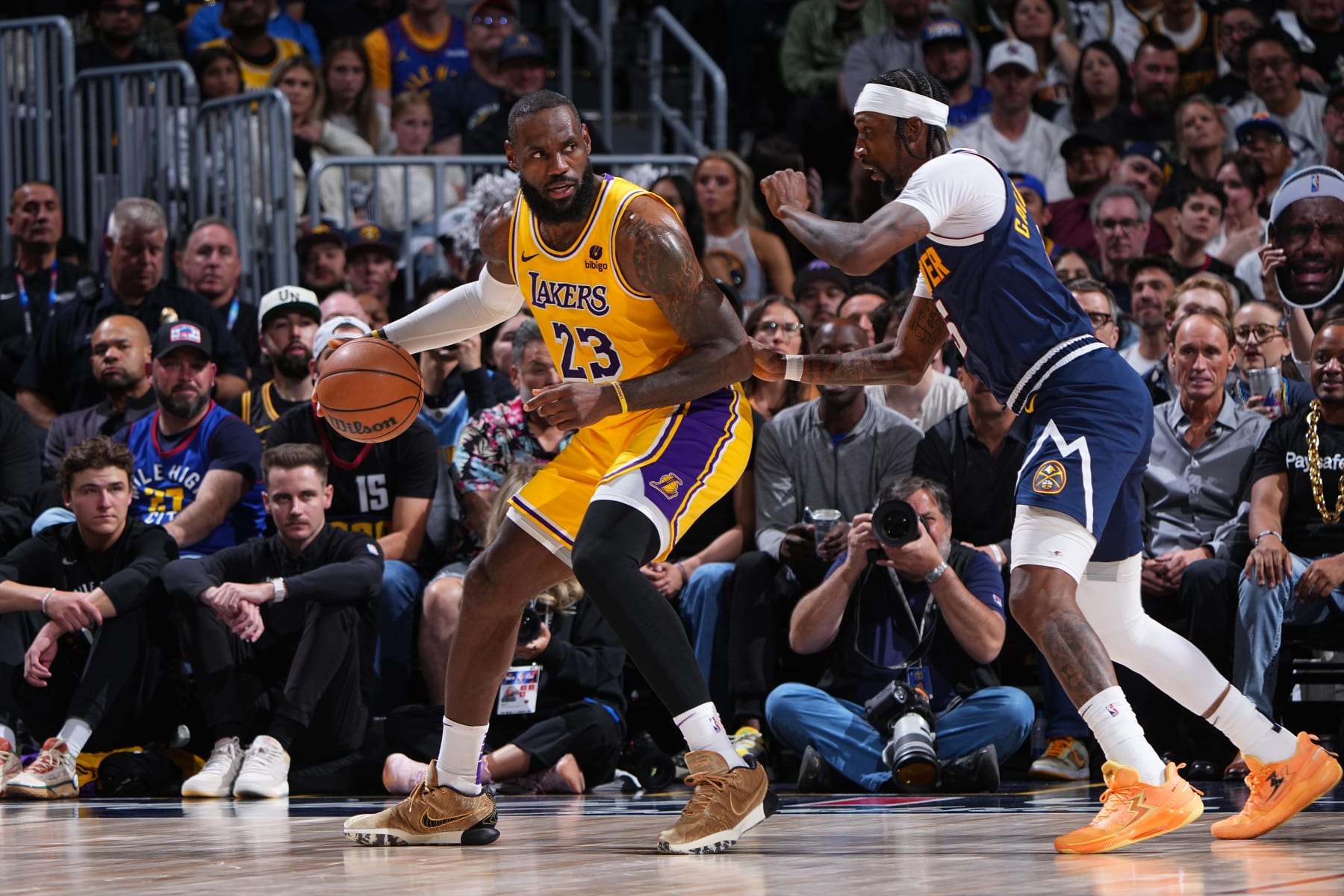 DENVER, CO - APRIL 29: LeBron James #23 of the Los Angeles Lakers dribbles the ball during the game against the Denver Nuggets during Round 1 Game 5 of the 2024 NBA Playoffs on April 29, 2024 at the Ball Arena in Denver, Colorado. NOTE TO USER: User expressly acknowledges and agrees that, by downloading and/or using this Photograph, user is consenting to the terms and conditions of the Getty Images License Agreement. Mandatory Copyright Notice: Copyright 2024 NBAE (Photo by Garrett Ellwood/NBAE via Getty Images)
