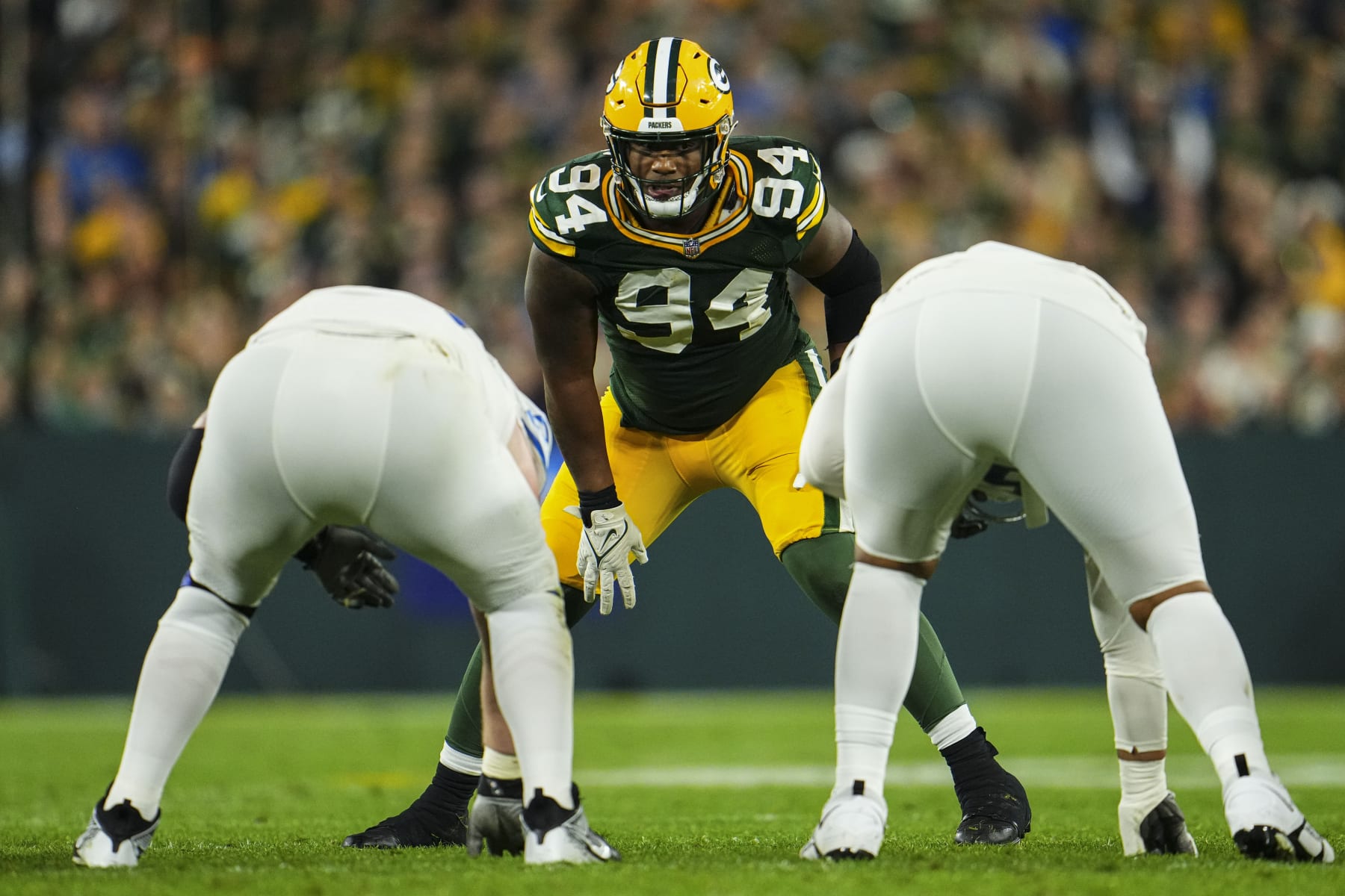 GREEN BAY, WI - SEPTEMBER 28: Karl Brooks #94 of the Green Bay Packers lines up before the play during at Lambeau Field on September 28, 2023 in Green Bay, Wisconsin. (Photo by Cooper Neill/Getty Images)
