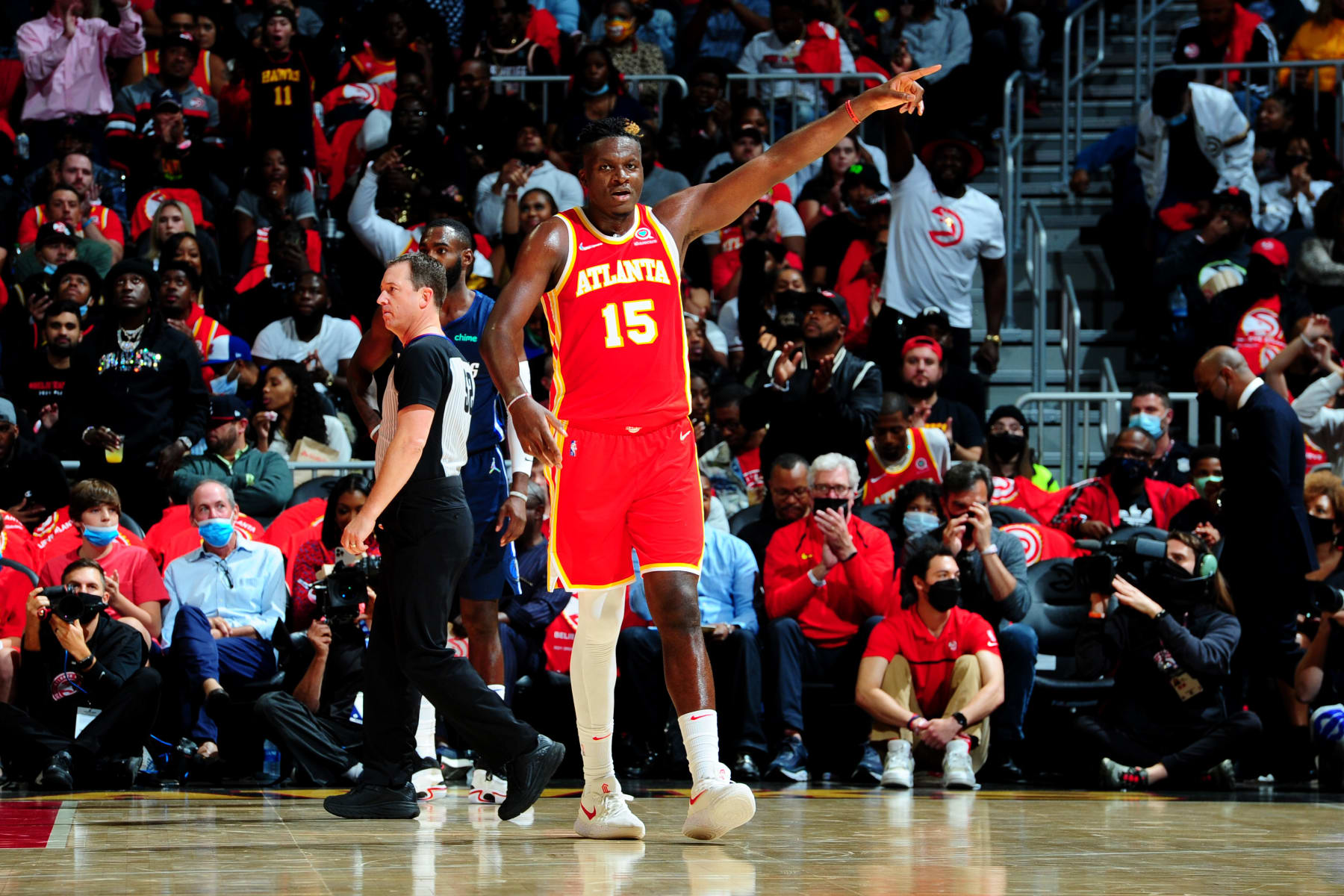 ATLANTA, GA -  OCTOBER 21: Clint Capela #15 of the Atlanta Hawks reacts to a play against the Dallas Mavericks on October 21, 2021 at State Farm Arena in Atlanta, Georgia.  NOTE TO USER: User expressly acknowledges and agrees that, by downloading and/or using this Photograph, user is consenting to the terms and conditions of the Getty Images License Agreement. Mandatory Copyright Notice: Copyright 2021 NBAE (Photo by Scott Cunningham/NBAE via Getty Images)