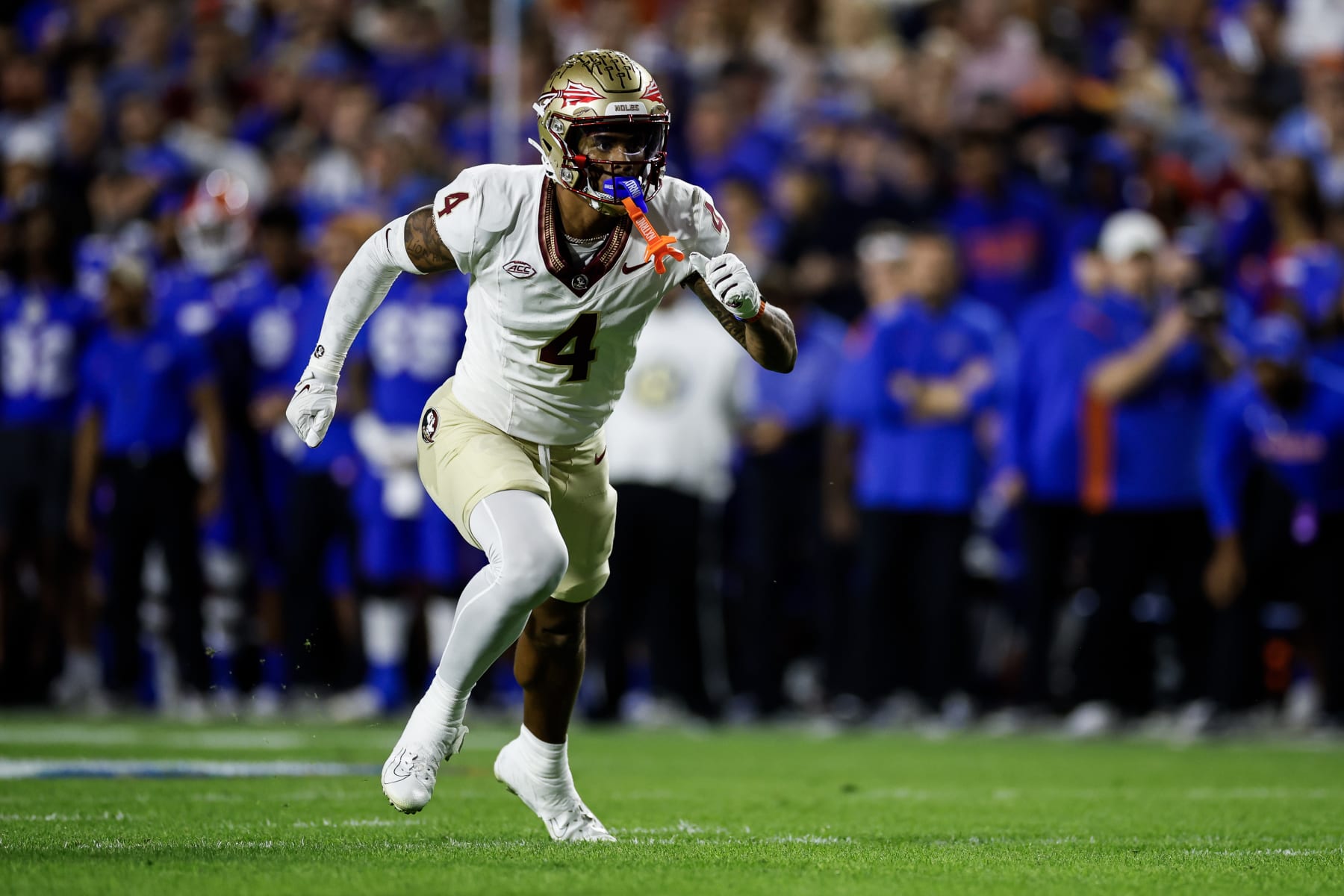 GAINESVILLE, FLORIDA - NOVEMBER 25: Keon Coleman #4 of the Florida State Seminoles runs during the second half of a game against the Florida Gators at Ben Hill Griffin Stadium on November 25, 2023 in Gainesville, Florida. (Photo by James Gilbert/Getty Images)