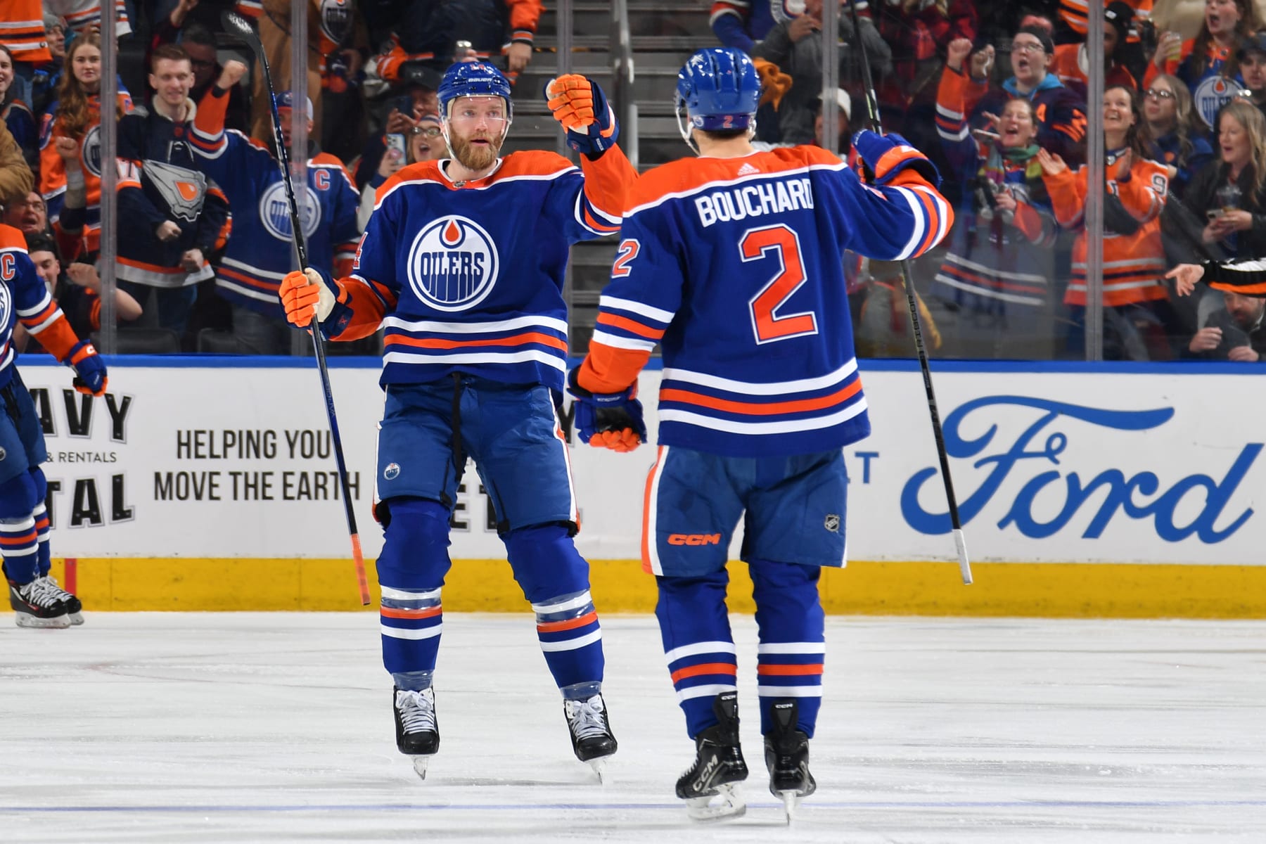 EDMONTON, CANADA - FEBRUARY 26: Evan Bouchard #2 of the Edmonton Oilers celebrates his third-period goal against the Los Angeles Kings with teammate Mattias Ekholm #14 at Rogers Place on February 26, 2024, in Edmonton, Alberta, Canada. (Photo by Andy Devlin/NHLI via Getty Images)