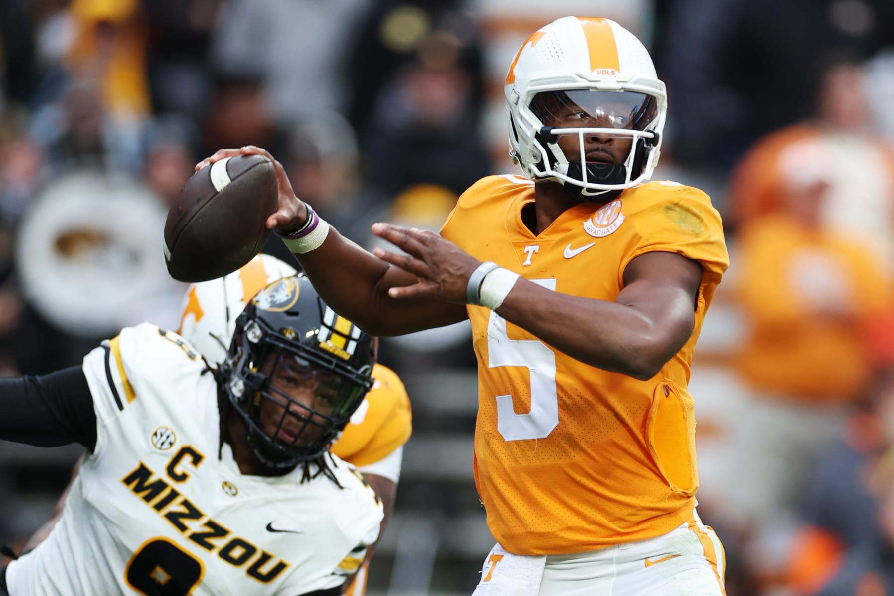 KNOXVILLE, TENNESSEE - NOVEMBER 12: Hendon Hooker #5 of the Tennessee Volunteers looks to pass against the Missouri Tigers at Neyland Stadium on November 12, 2022 in Knoxville, Tennessee. The Tennessee Volunteers won the game 66-24. (Photo by Donald Page/Getty Images)