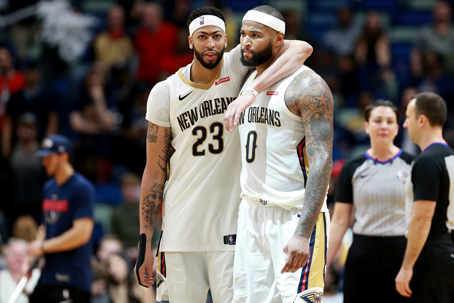 NEW ORLEANS, LA - JANUARY 22:  Anthony Davis #23 of the New Orleans Pelicans and DeMarcus Cousins #0 of the New Orleans Pelicans walk of the court during a NBA game against the Chicago Bulls at the Smoothie King Center on January 22, 2018 in New Orleans, Louisiana. NOTE TO USER: User expressly acknowledges and agrees that, by downloading and or using this photograph, User is consenting to the terms and conditions of the Getty Images License Agreement.  (Photo by Sean Gardner/Getty Images)