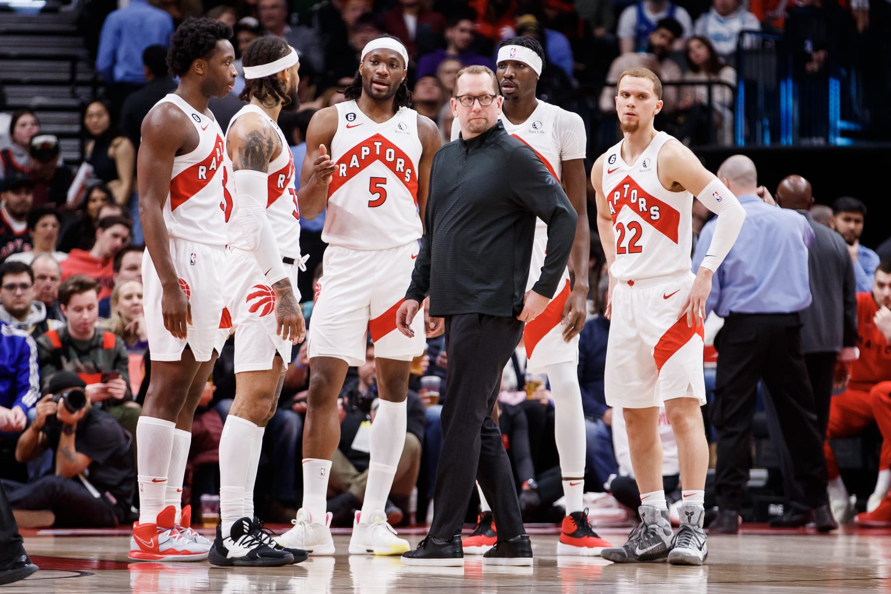 TORONTO, ON - JANUARY 10: Nick Nurse, head coach of the Toronto Raptors talks with players during a timeout in the second half of their NBA game against the Charlotte Hornets at Scotiabank Arena on January 10, 2023 in Toronto, Canada. NOTE TO USER: User expressly acknowledges and agrees that, by downloading and or using this photograph, User is consenting to the terms and conditions of the Getty Images License Agreement. (Photo by Cole Burston/Getty Images)