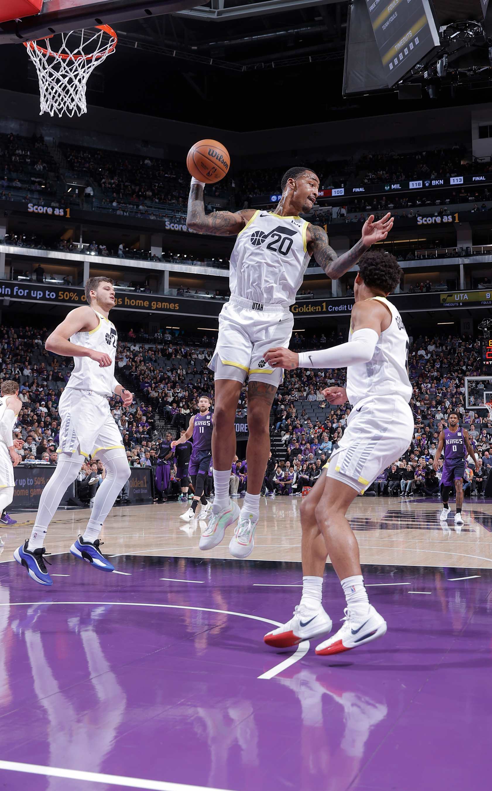 SACRAMENTO, CA - DECEMBER 8: John Collins #20 of the Utah Jazz rebounds the ball during the game against the Sacramento Kings on December 8, 2024 at Golden 1 Center in Sacramento, California. NOTE TO USER: User expressly acknowledges and agrees that, by downloading and or using this photograph, User is consenting to the terms and conditions of the Getty Images Agreement. Mandatory Copyright Notice: Copyright 2024 NBAE (Photo by Rocky Widner/NBAE via Getty Images)