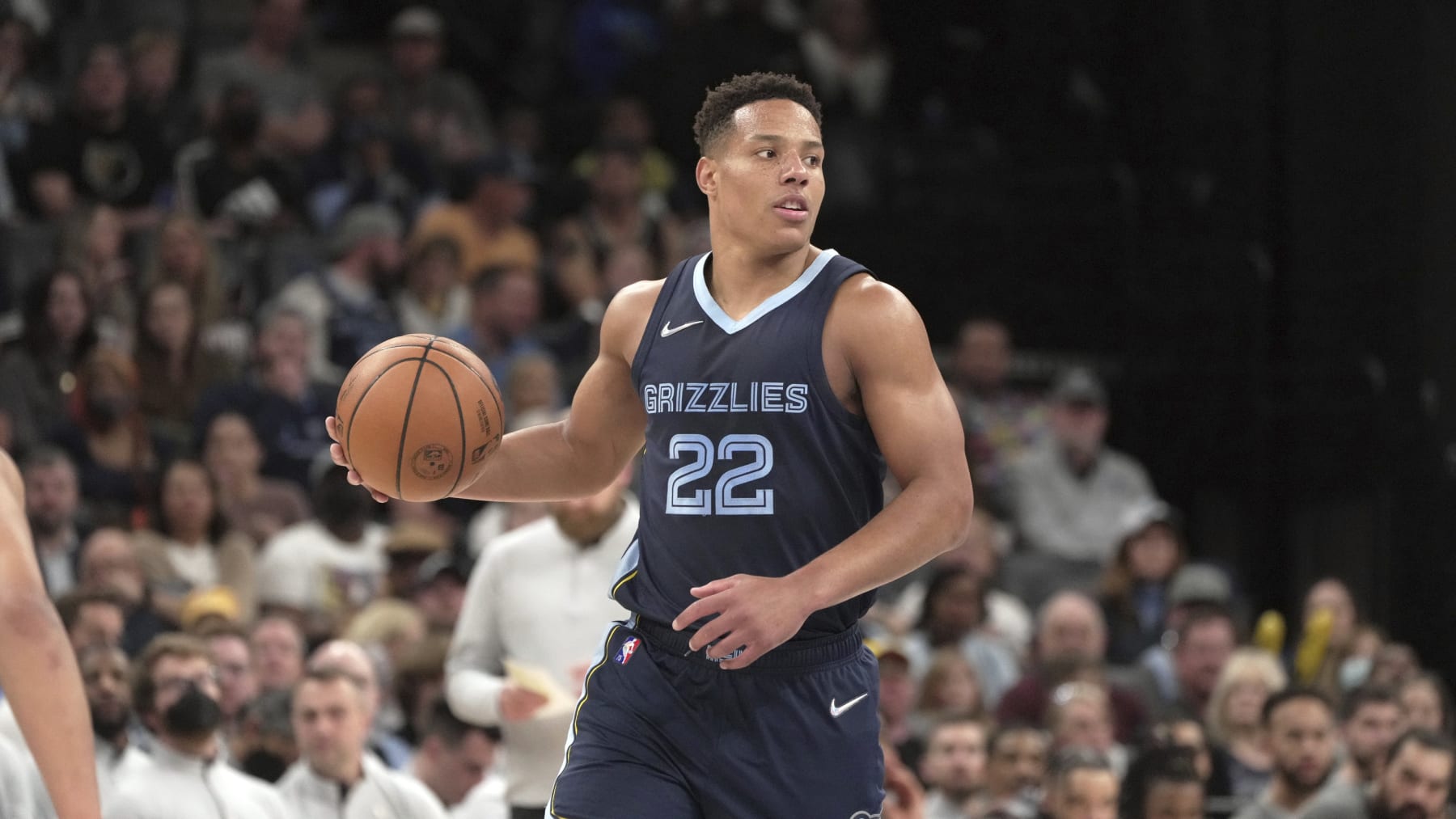 Desmond Bane (22) plays against the Orlando Magic during an NBA basketball game Saturday, March 5, 2022, in Memphis, Tenn. (AP Photo/Karen Pulfer Focht)
