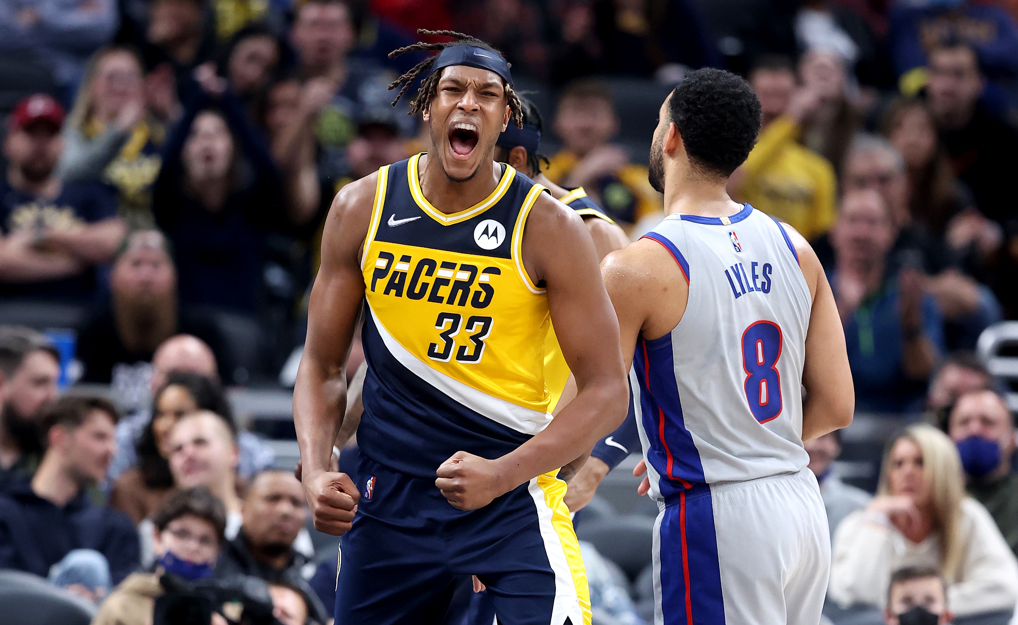 INDIANAPOLIS, INDIANA - DECEMBER 16: Myles Turner #33 of the  Indiana Pacers celebrates against the Detroit Pistons at Gainbridge Fieldhouse on December 16, 2021 in Indianapolis, Indiana.     NOTE TO USER: User expressly acknowledges and agrees that, by downloading and or using this Photograph, user is consenting to the terms and conditions of the Getty Images License Agreement.  (Photo by Andy Lyons/Getty Images)