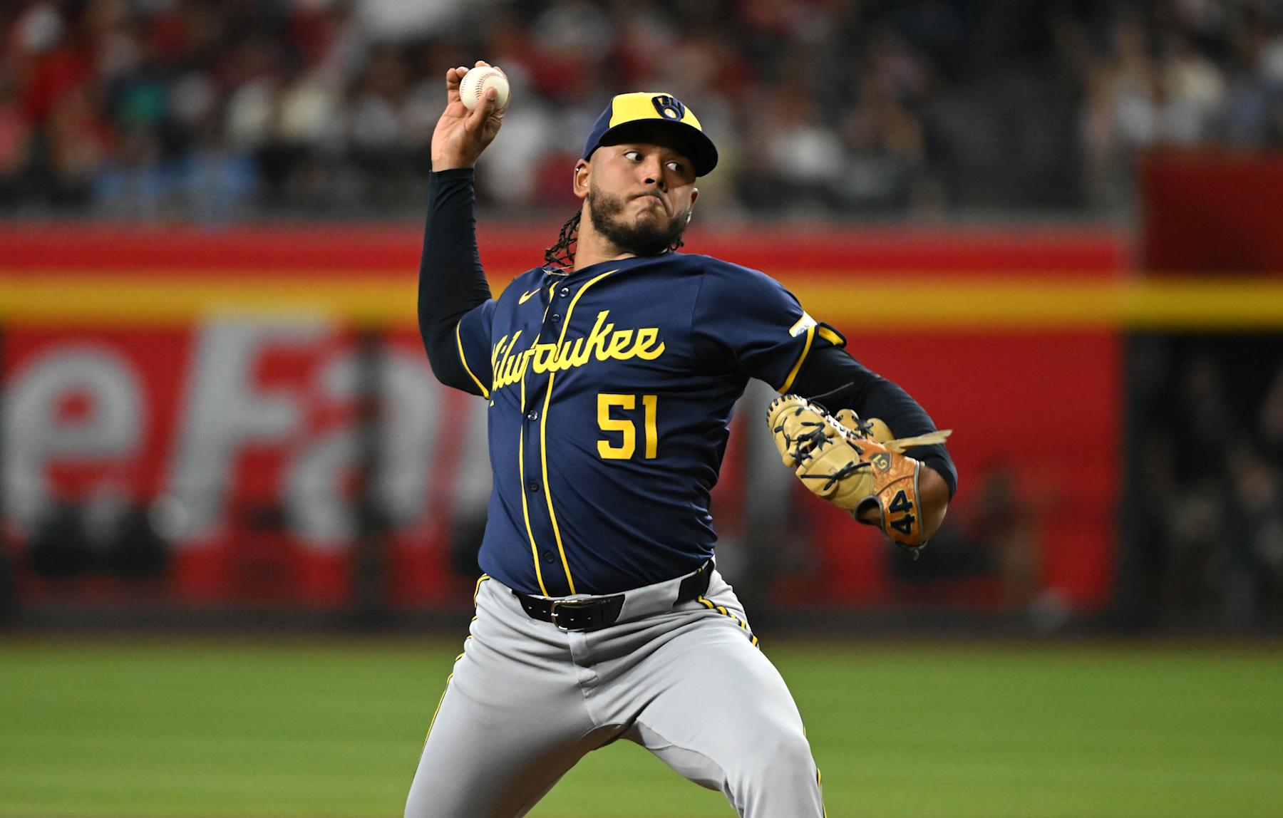 PHOENIX, ARIZONA - SEPTEMBER 13: Freddy Peralta #51 of the Milwaukee Brewers delivers a first inning pitch against the Arizona Diamondbacks at Chase Field on September 13, 2024 in Phoenix, Arizona. (Photo by Norm Hall/Getty Images)