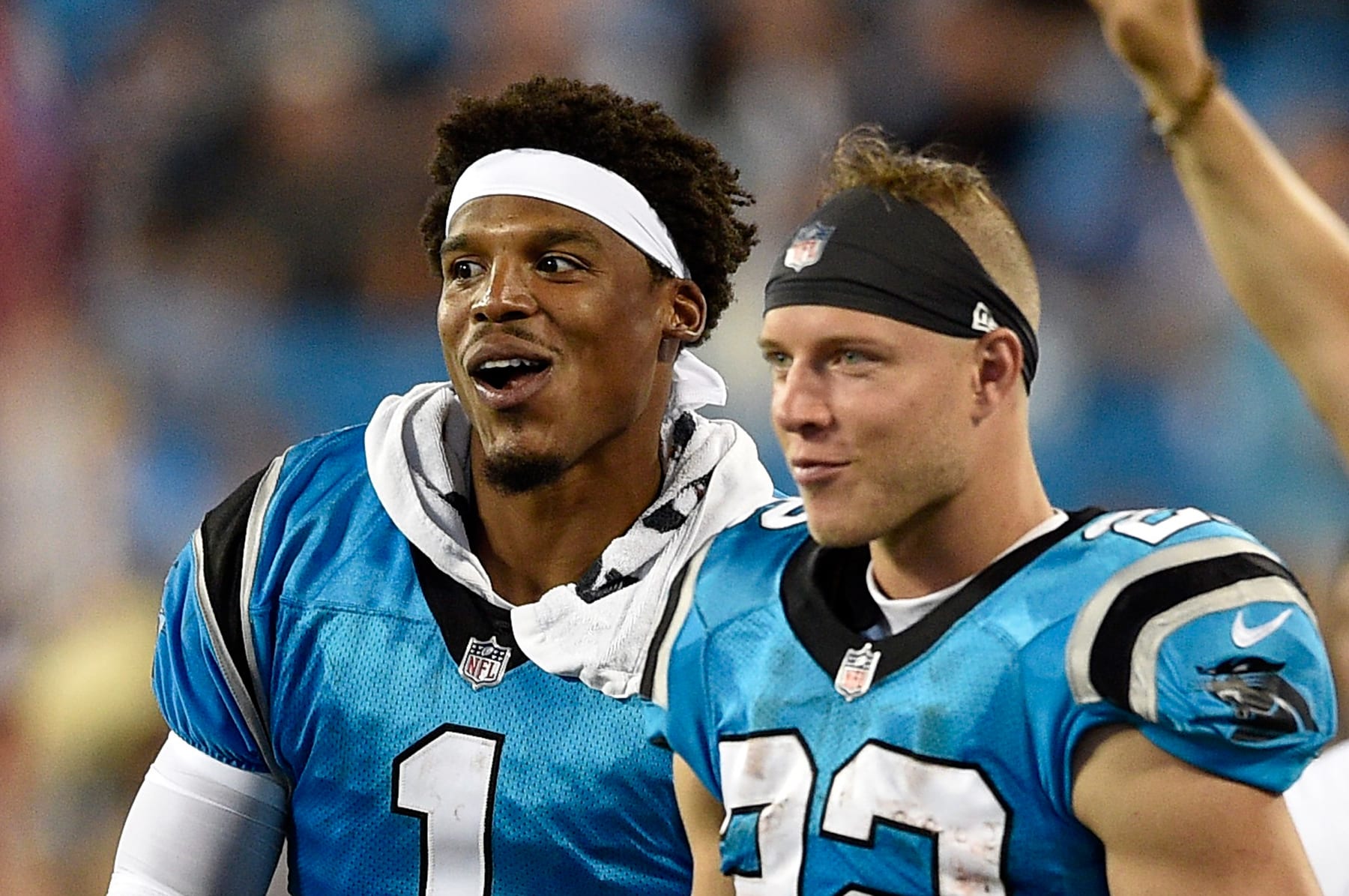 CHARLOTTE, NC - AUGUST 17:  Cam Newton #1 and teammate Christian McCaffrey #22 of the Carolina Panthers react after a third quarter touchdown against the Miami Dolphins during the game at Bank of America Stadium on August 17, 2018 in Charlotte, North Carolina.  (Photo by Grant Halverson/Getty Images)