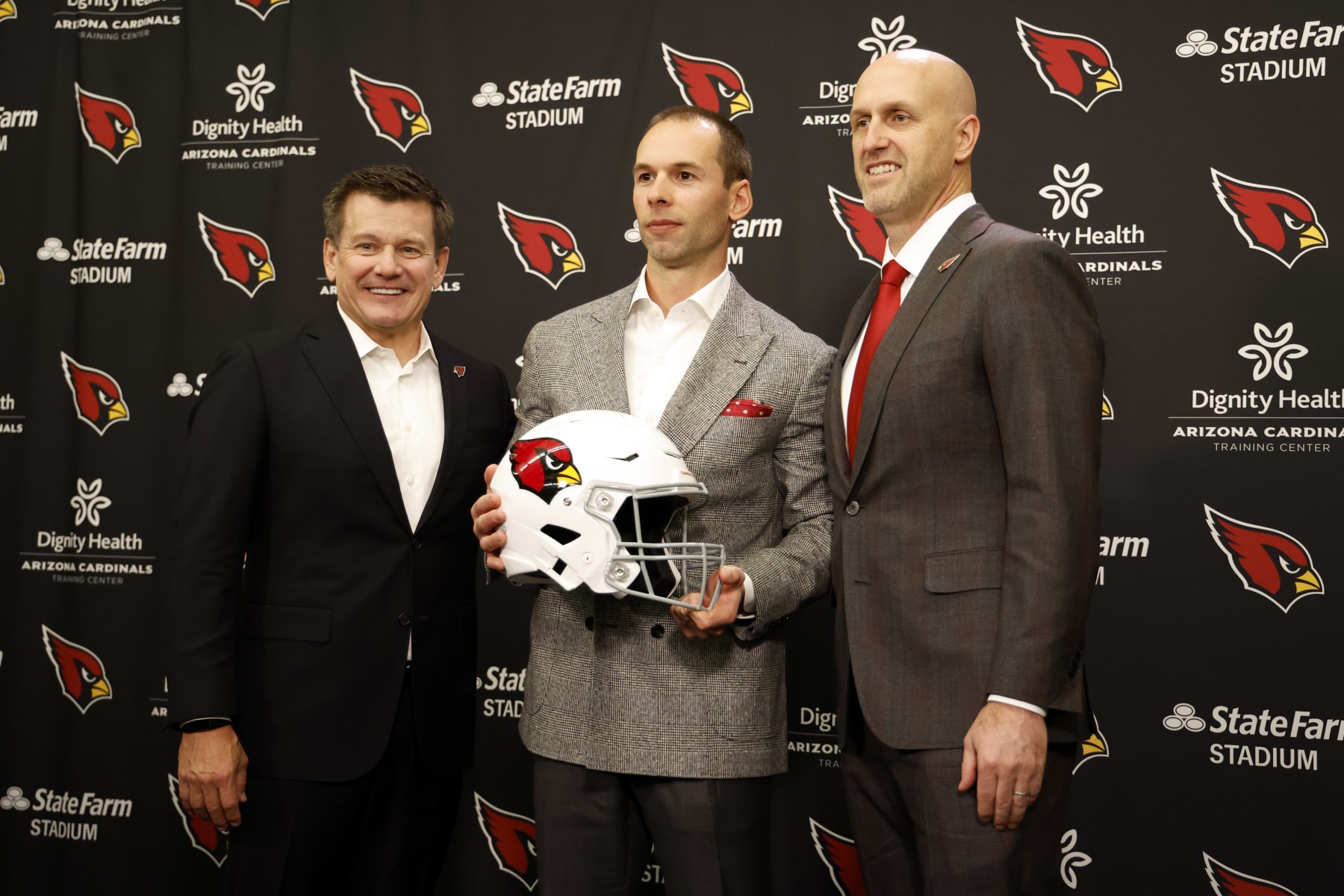 TEMPE, ARIZONA - FEBRUARY 16: (L-R) Owner Michael Bidwill, new head coach Jonathan Gannon and general manager Monti Ossenfort of the Arizona Cardinals pose for a photo during a press conference at Dignity Health Arizona Cardinals Training Center on February 16, 2023 in Tempe, Arizona. (Photo by Chris Coduto/Getty Images)