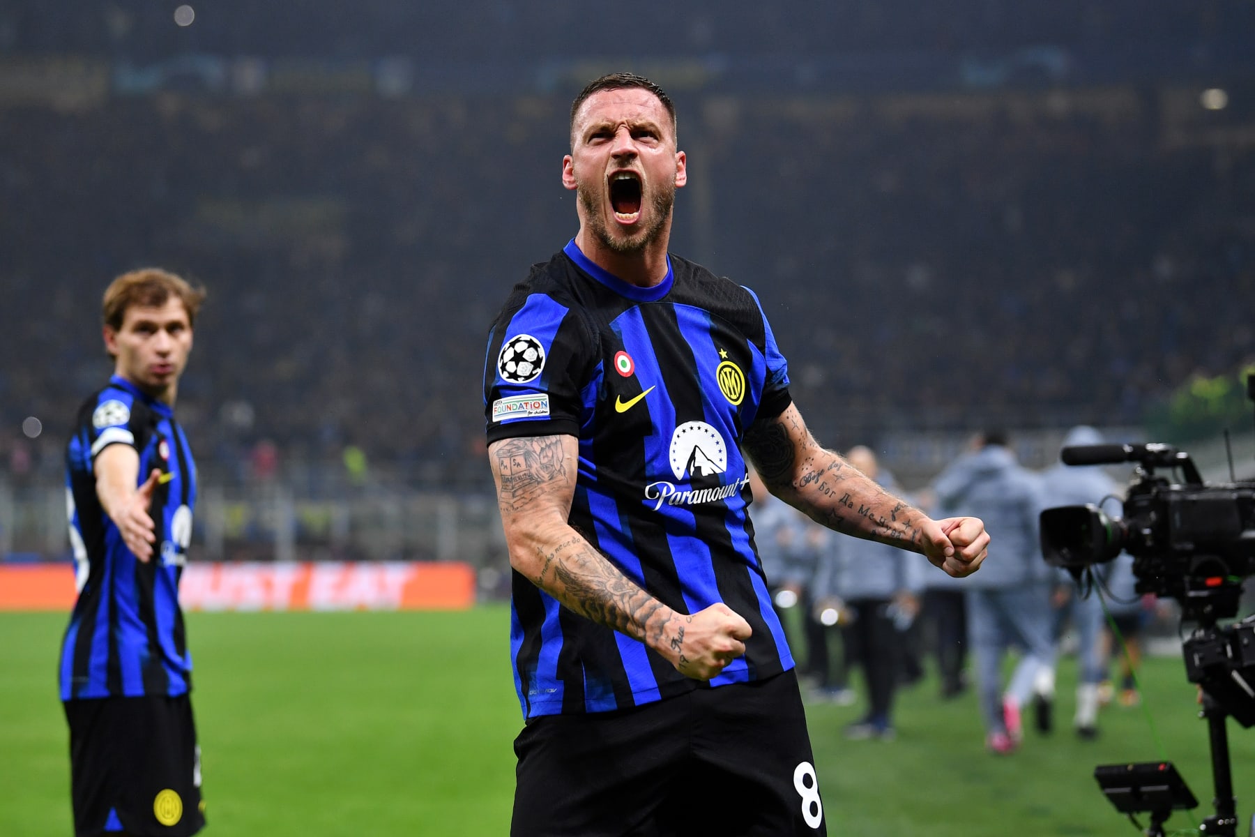 MILAN, ITALY - FEBRUARY 20: Marko Arnautovic of FC Internazionale celebrates scoring his team's first goal during the UEFA Champions League 2023/24 round of 16 first leg match between FC Internazionale and Atletico Madrid at Stadio Giuseppe Meazza on February 20, 2024 in Milan, Italy. (Photo by Valerio Pennicino - UEFA/UEFA via Getty Images)
