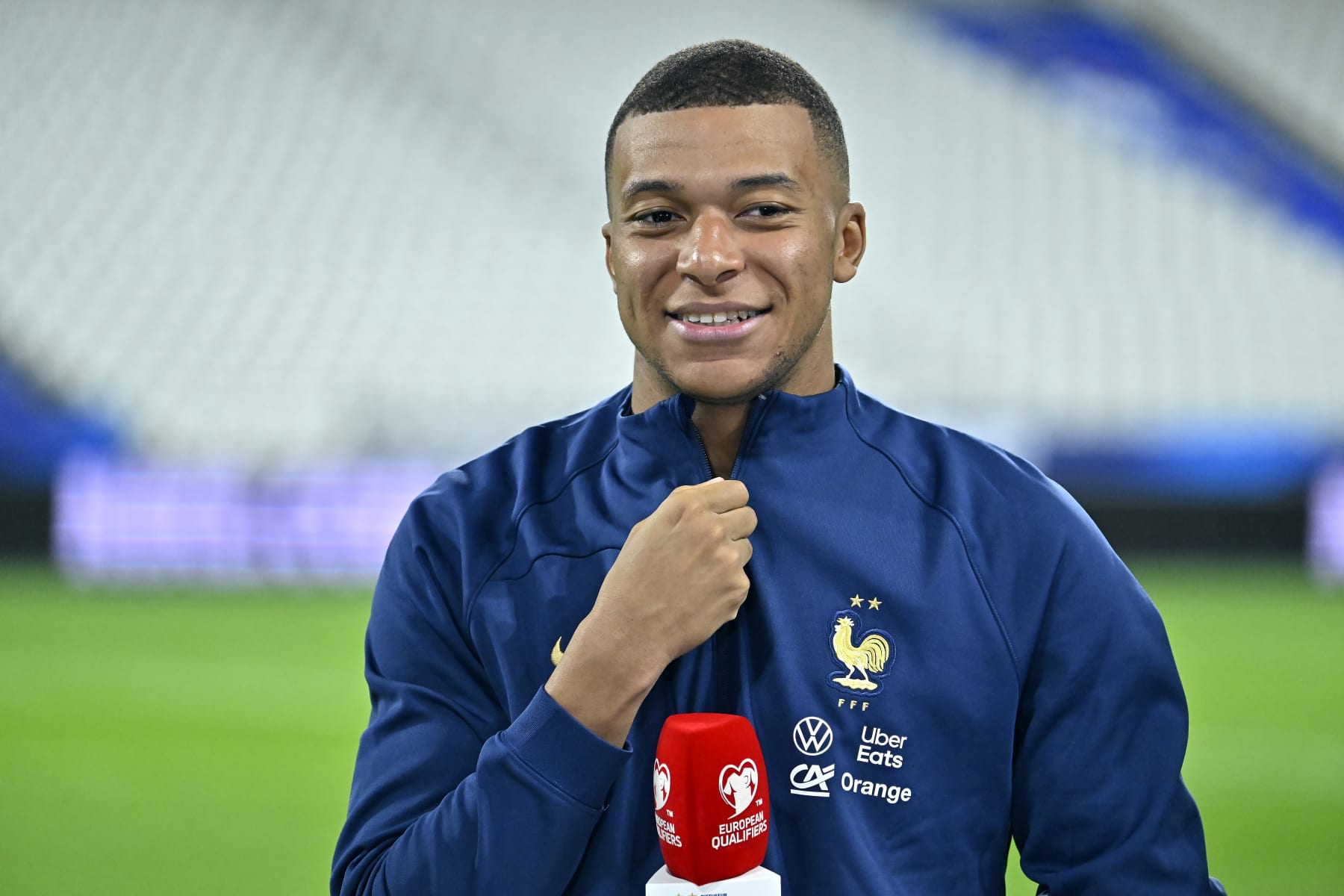 PARIS, FRANCE - JUNE 19: Kylian Mbappe of France  is interviewed after the team's victory in the UEFA EURO 2024 qualifying round group B match between France and Greece at Stade de France on June 19, 2023 in Paris, France. (Photo by Aurelien Meunier - UEFA/UEFA via Getty Images)