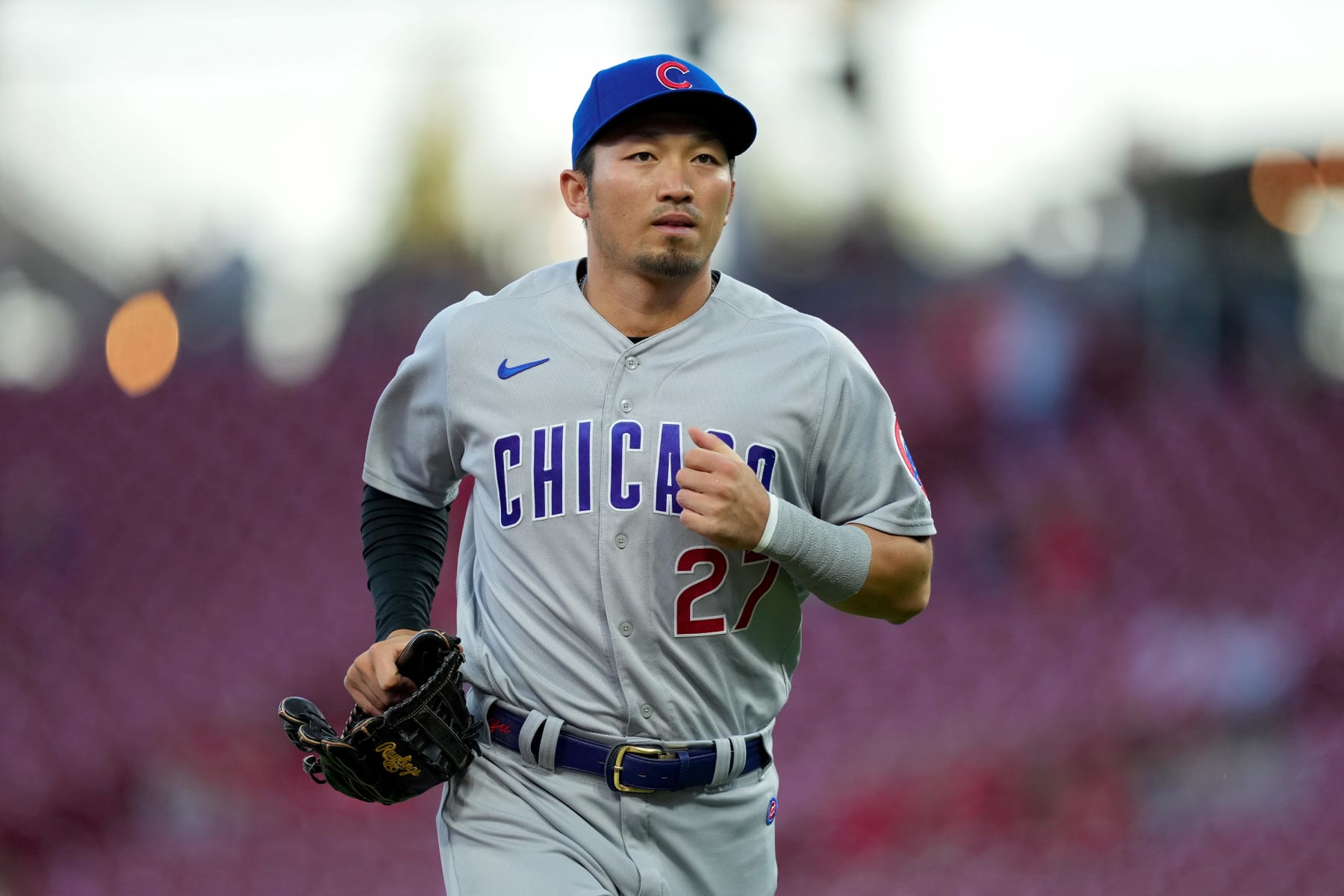 CINCINNATI, OHIO - OCTOBER 03: Seiya Suzuki #27 of the Chicago Cubs jogs across the field in the first inning against the Cincinnati Reds at Great American Ball Park on October 03, 2022 in Cincinnati, Ohio. (Photo by Dylan Buell/Getty Images)