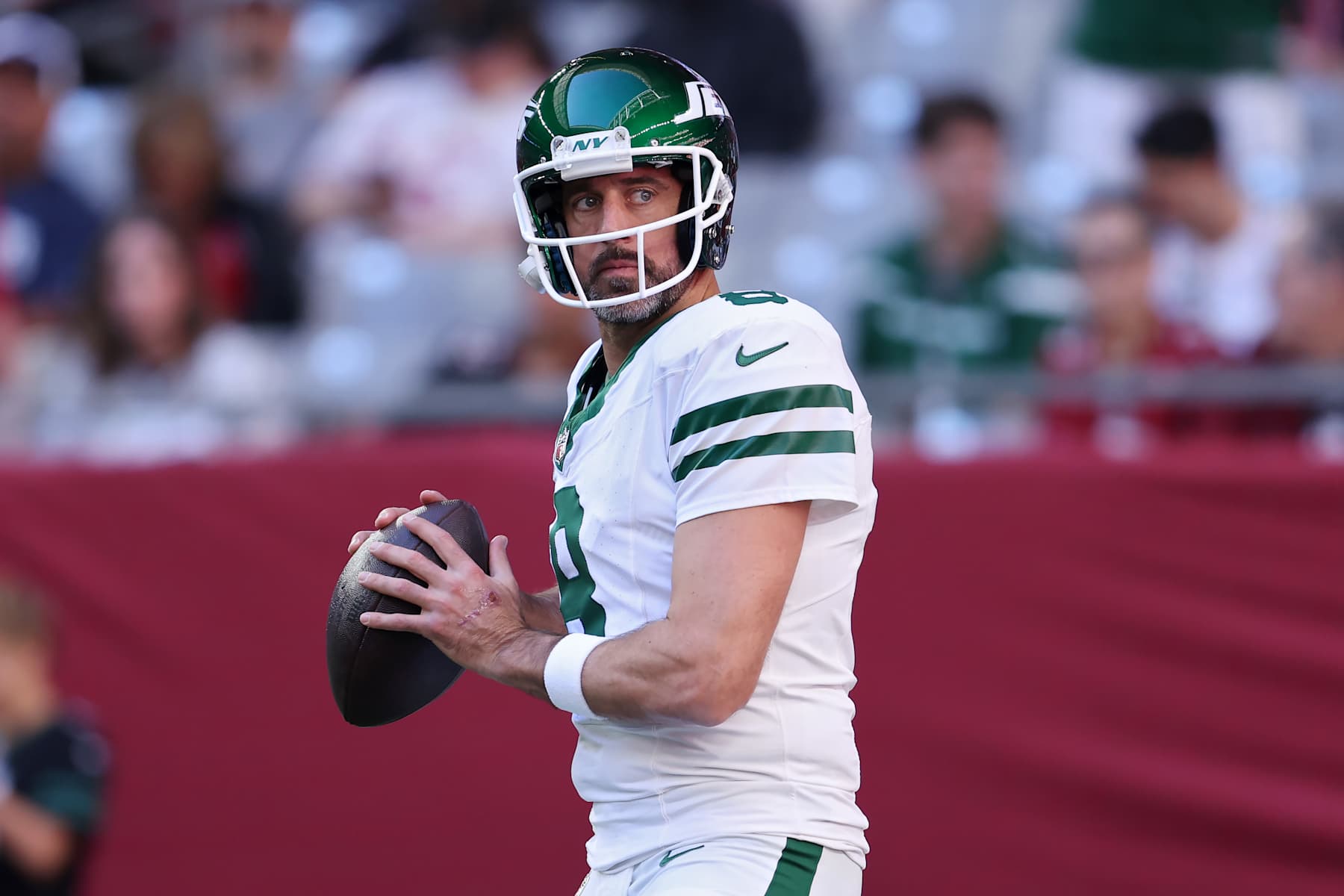 GLENDALE, ARIZONA - NOVEMBER 10: Aaron Rodgers #8 of the New York Jets warms up before the game against the Arizona Cardinals at State Farm Stadium on November 10, 2024 in Glendale, Arizona. (Photo by Chris Coduto/Getty Images) GLENDALE, ARIZONA - NOVEMBER 10: Aaron Rodgers #8 of the New York Jets warms up before the game against the Arizona Cardinals at State Farm Stadium on November 10, 2024 in Glendale, Arizona. (Photo by Chris Coduto/Getty Images)
