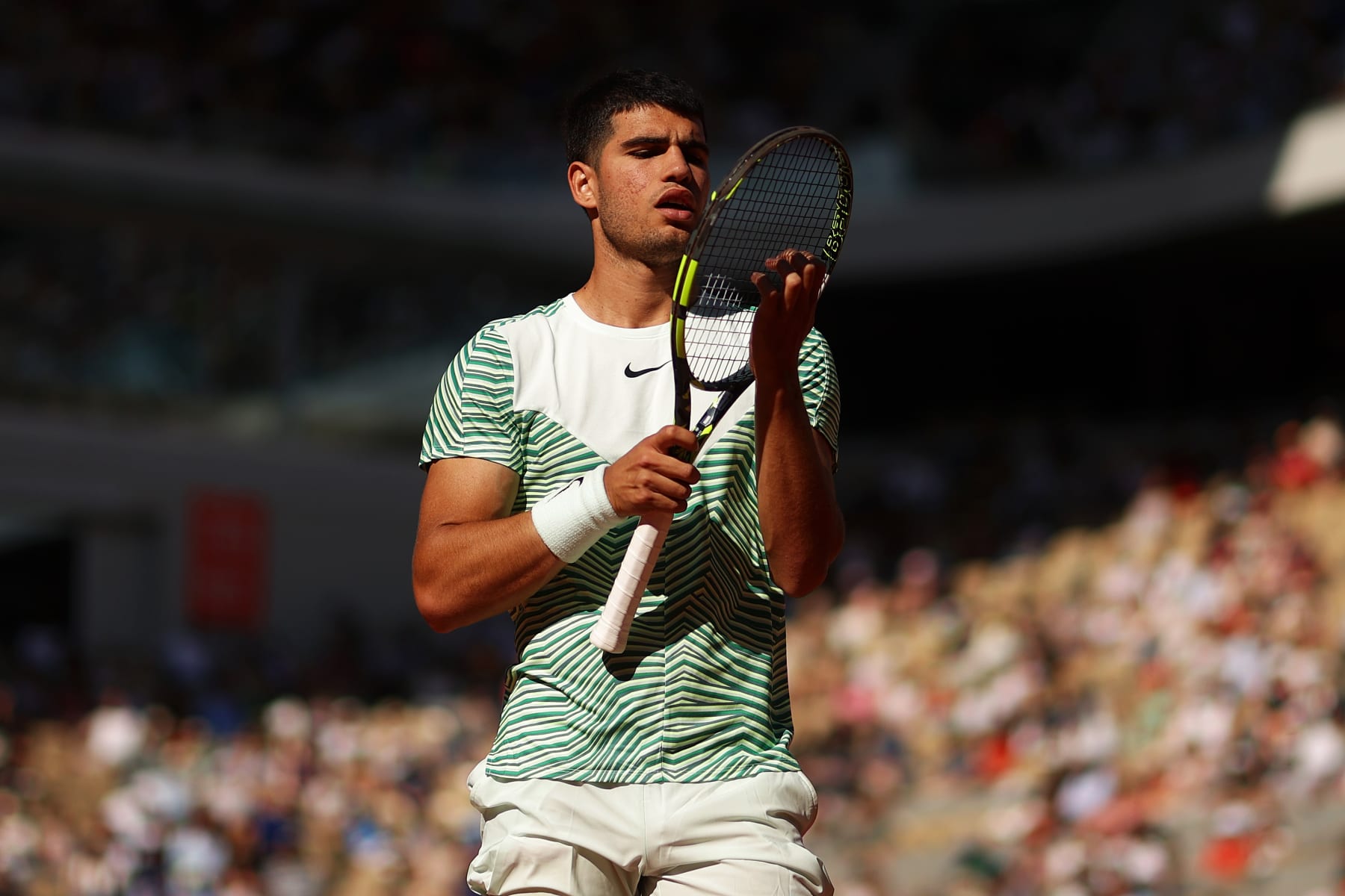 PARIS, FRANCE - MAY 31: Carlos Alcaraz of Spain reacts against Taro Daniel of Japan during the Men's Singles Second Round Match on Day Four of the 2023 French Open at Roland Garros on May 31, 2023 in Paris, France. (Photo by Julian Finney/Getty Images)