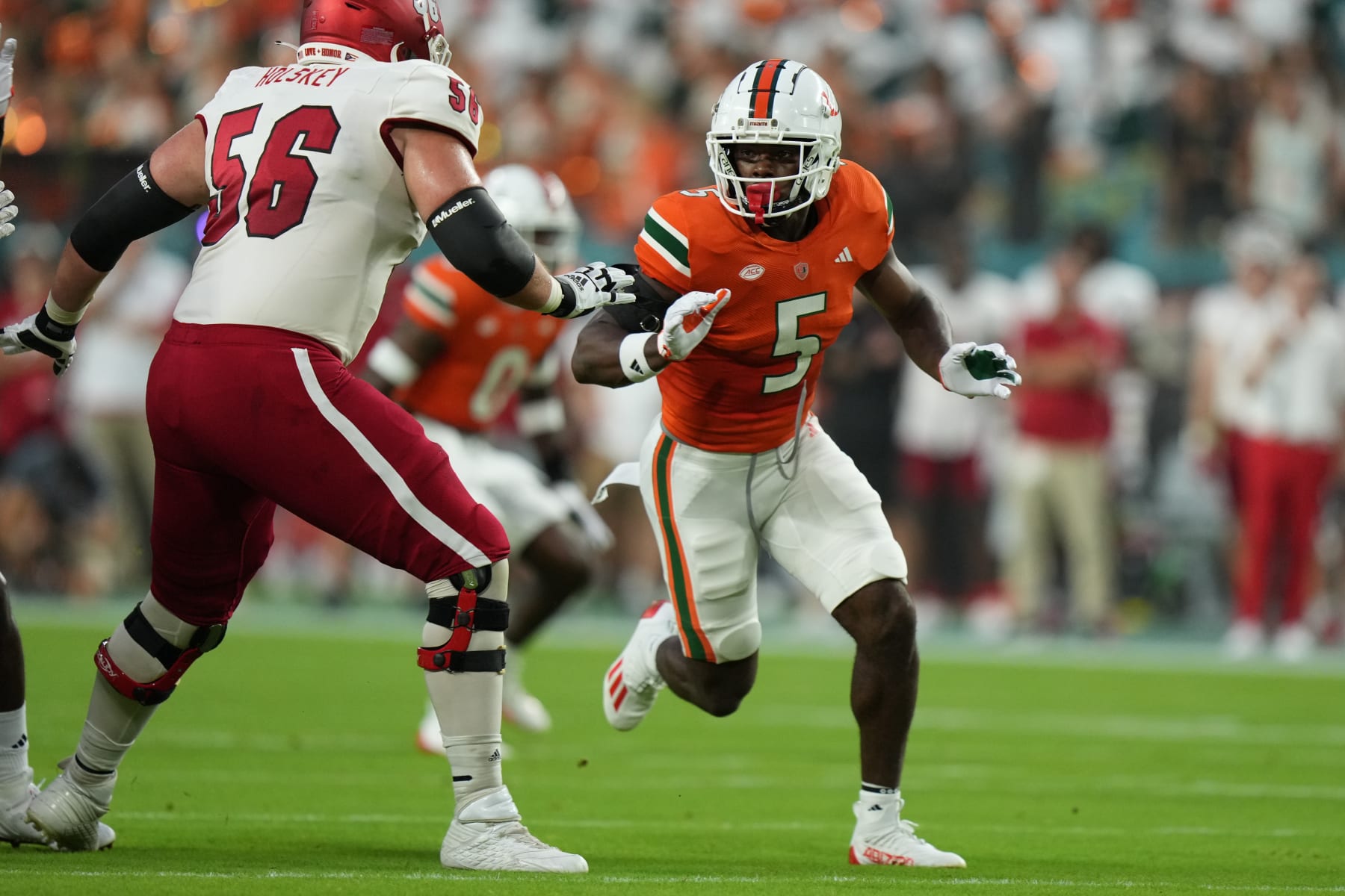 MIAMI GARDENS, FL - SEPTEMBER 01: Miami Hurricanes safety Kamren Kinchens (5) rushes the quarterback during the game between the Miami (Ohio) Redhawks and the Miami (FL) Hurricanes on Friday, September 1, 2023 at Hard Rock Stadium, Miami Gardens, Fla. (Photo by Peter Joneleit/Icon Sportswire via Getty Images)