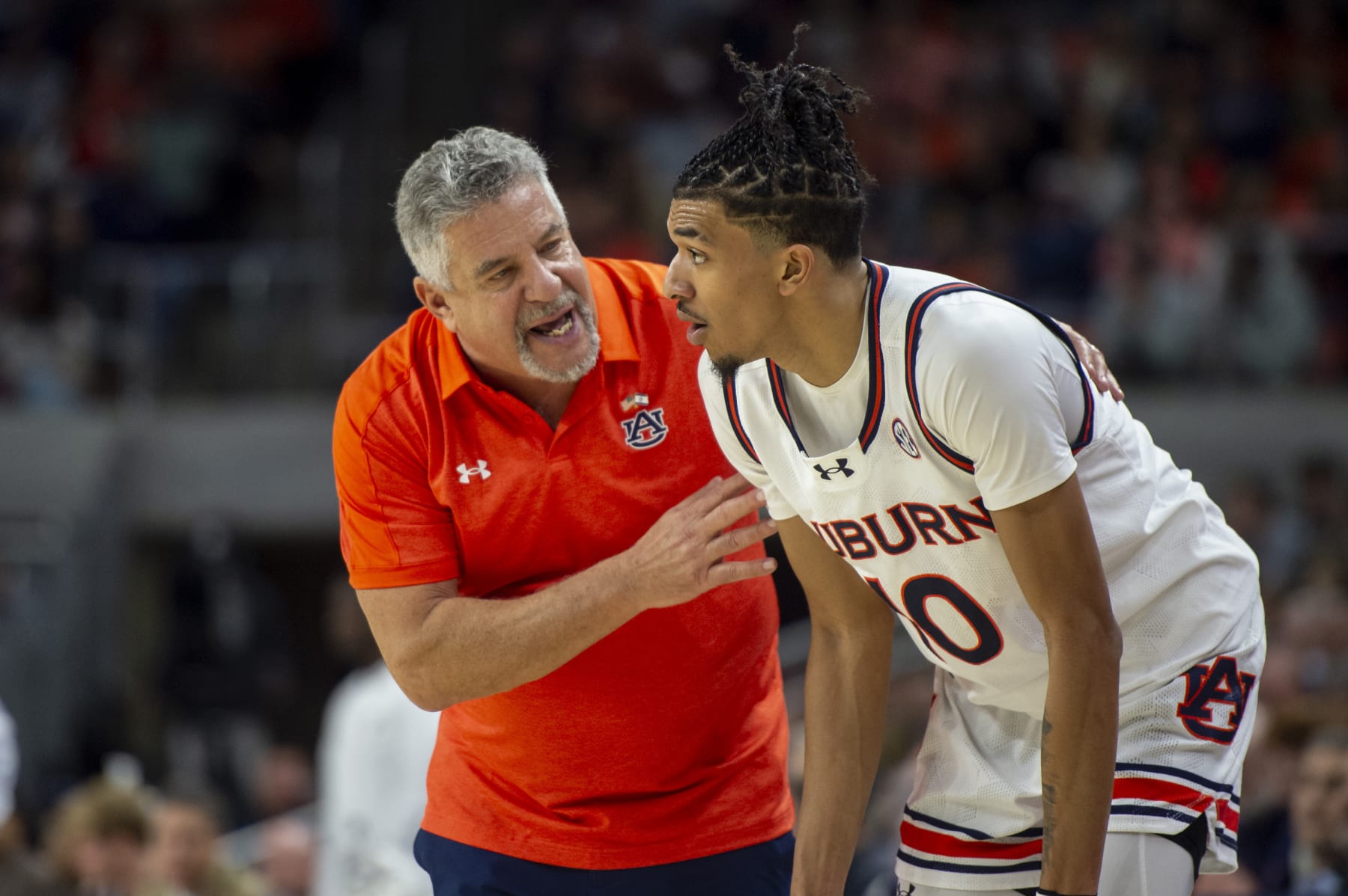 AUBURN, ALABAMA - JANUARY 09: Head coach Bruce Pearl of the Auburn Tigers speaks with Chad Baker-Mazara #10 of the Auburn Tigers during their game against the Texas A&M Aggies at Neville Arena on January 09, 2024 in Auburn, Alabama. (Photo by Michael Chang/Getty Images)