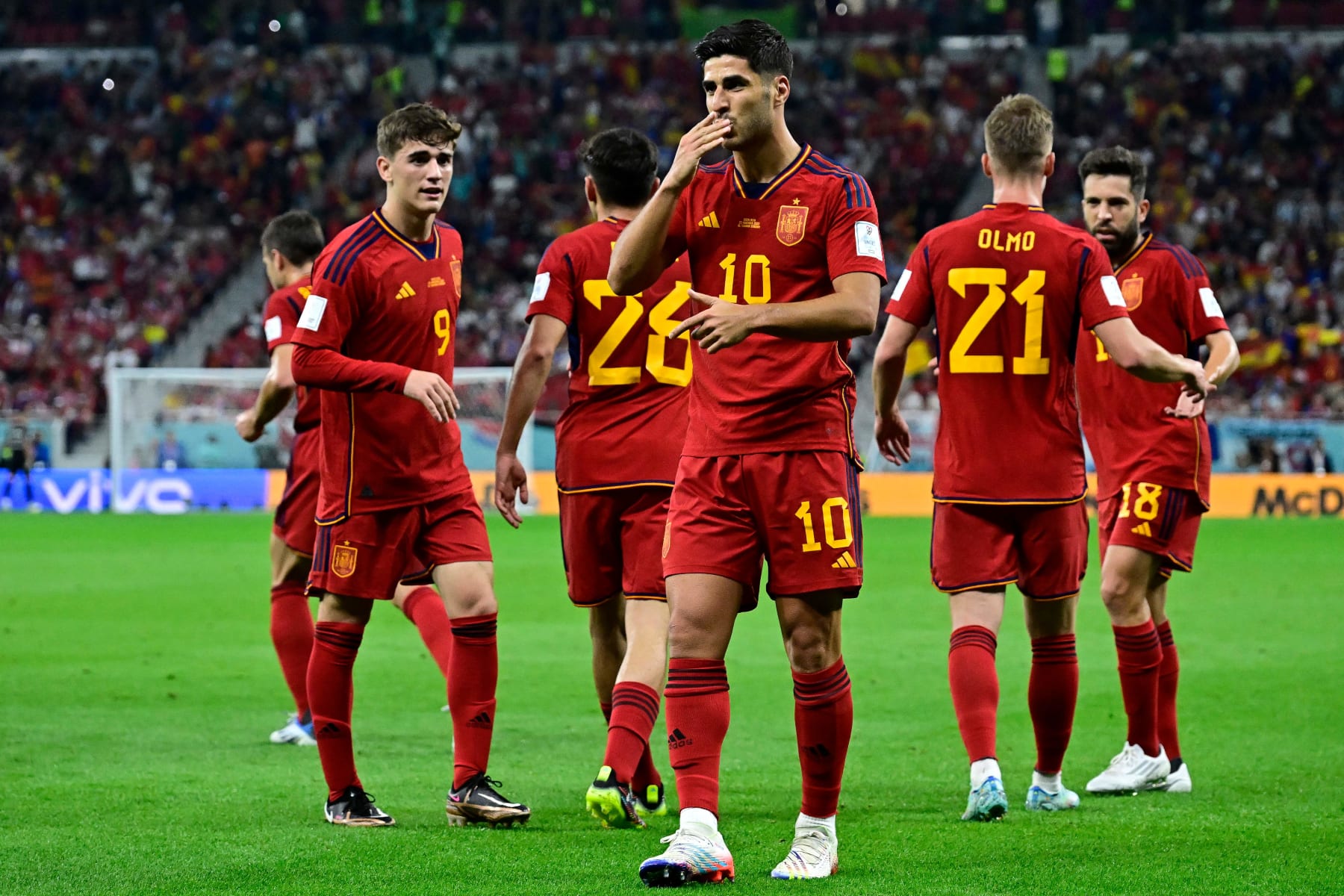 Spain's forward #10 Marco Asensio reacts after scoring the second goal during the Qatar 2022 World Cup Group E football match between Spain and Costa Rica at the Al-Thumama Stadium in Doha on November 23, 2022. (Photo by JAVIER SORIANO / AFP) (Photo by JAVIER SORIANO/AFP via Getty Images)