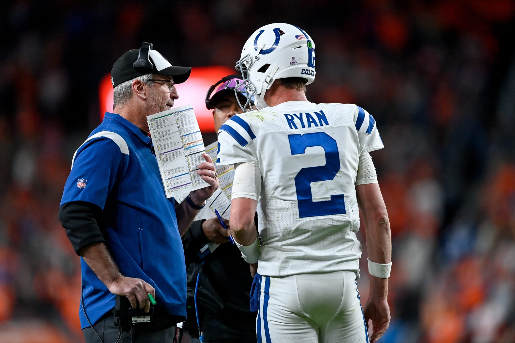 DENVER, COLORADO - OCTOBER 6:  Head coach Frank Reich has a word with quarterback Matt Ryan #2 of the Indianapolis Colts in the fourth quarter of a game against the Denver Broncos at Empower Field at Mile High on October 6, 2022 in Denver, Colorado. (Photo by Dustin Bradford/Getty Images)
