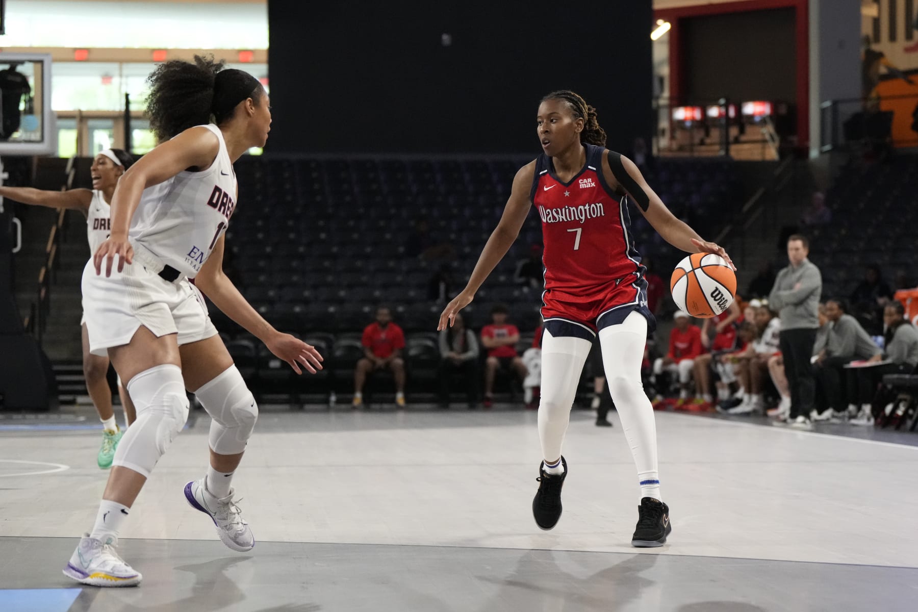 COLLEGE PARK, GA - MAY 4: Ariel Atkins #7 of the Washington Mystics dribbles the ball during the game against the Atlanta Dream during a WNBA Preseason game on May 4, 2024 at Gateway Center Arena in College Park, GA.  NOTE TO USER: User expressly acknowledges and agrees that, by downloading and/or using this Photograph, user is consenting to the terms and conditions of the Getty Images License Agreement. Mandatory Copyright Notice: Copyright 2024 NBAE (Photo by Dale Zanine/NBAE via Getty Images)
