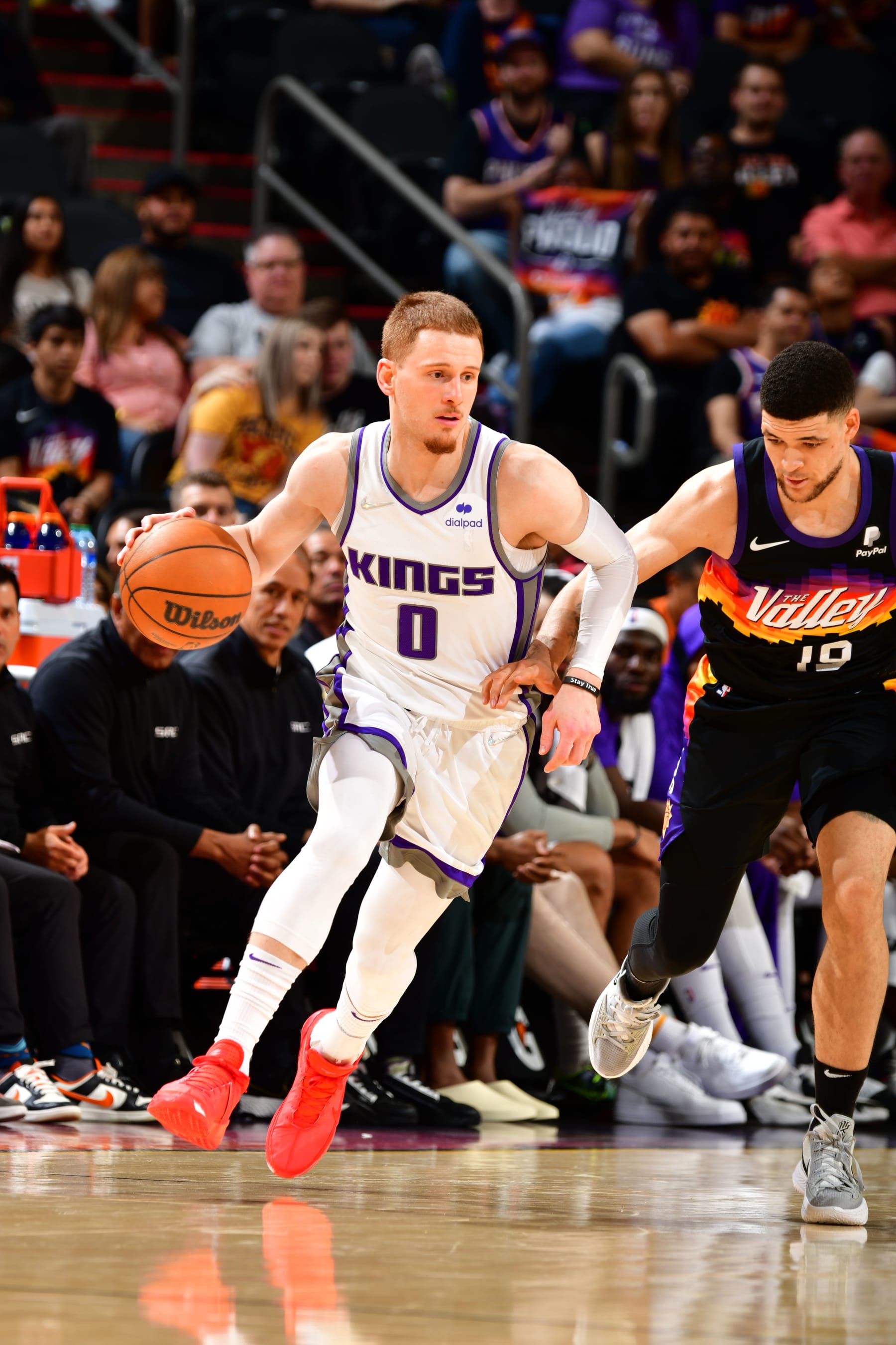 PHOENIX, AZ - APRIL 10: Donte DiVincenzo #0 of the Sacramento Kings dribbles the ball during the game against the Phoenix Suns on April 10, 2022 at Footprint Center in Phoenix, Arizona. NOTE TO USER: User expressly acknowledges and agrees that, by downloading and or using this photograph, user is consenting to the terms and conditions of the Getty Images License Agreement. Mandatory Copyright Notice: Copyright 2022 NBAE (Photo by Barry Gossage/NBAE via Getty Images)