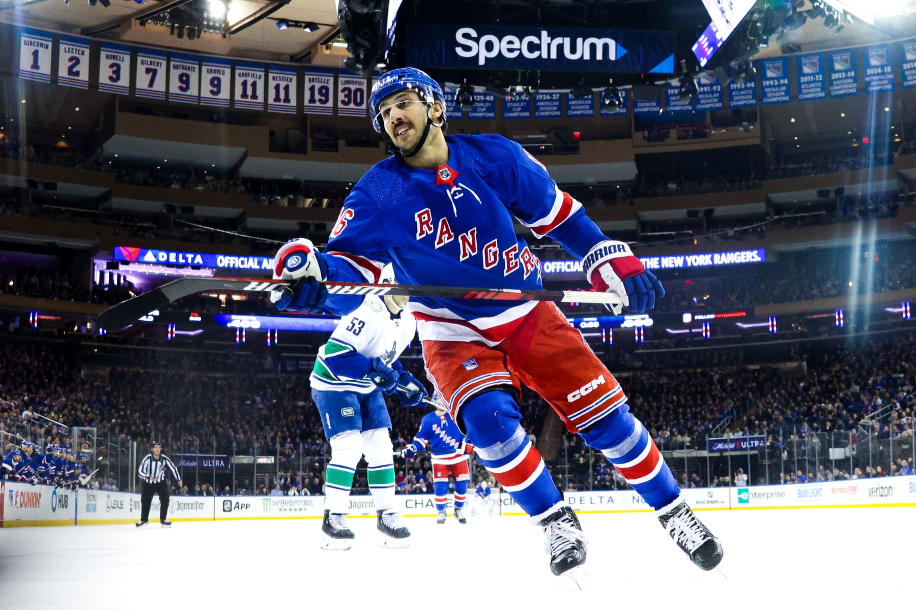 NEW YORK, NEW YORK - JANUARY 08:  Vincent Trocheck #16 of the New York Rangers celebrates a first period goal against the Vancouver Canucks at Madison Square Garden on January 8, 2024 in New York City. (Photo by Jared Silber/NHLI via Getty Images)