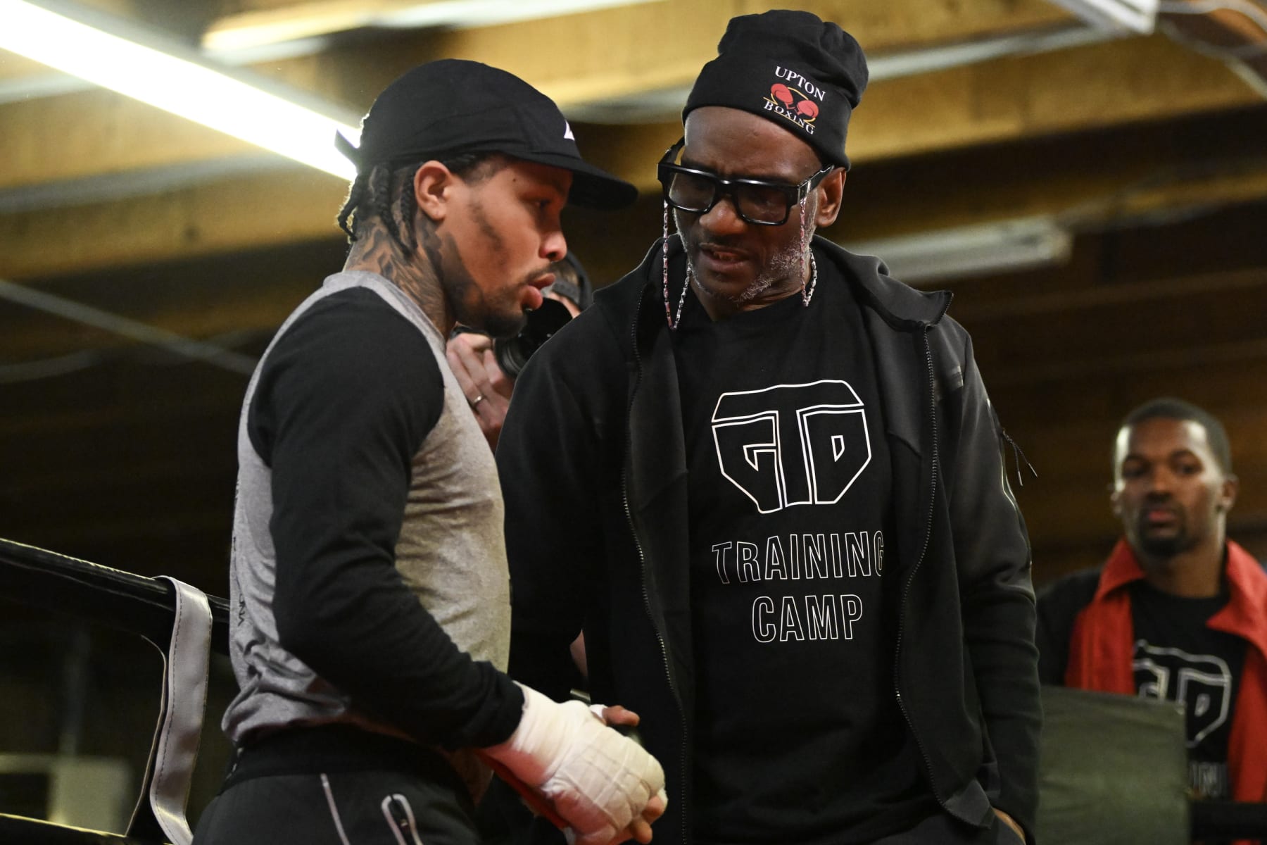 LAS VEGAS, NEVADA - APRIL 06: WBA lightweight champion Gervonta Davis (L) speaks to his head trainer, Calvin Ford, in the ring during a workout at Barry’s Boxing Gym on April 06, 2023 in Las Vegas, Nevada. Davis is scheduled to fight Ryan Garcia in a catchweight bout on April 22, 2023 at T-Mobile Arena in Las Vegas. (Photo by Candice Ward/Getty Images)