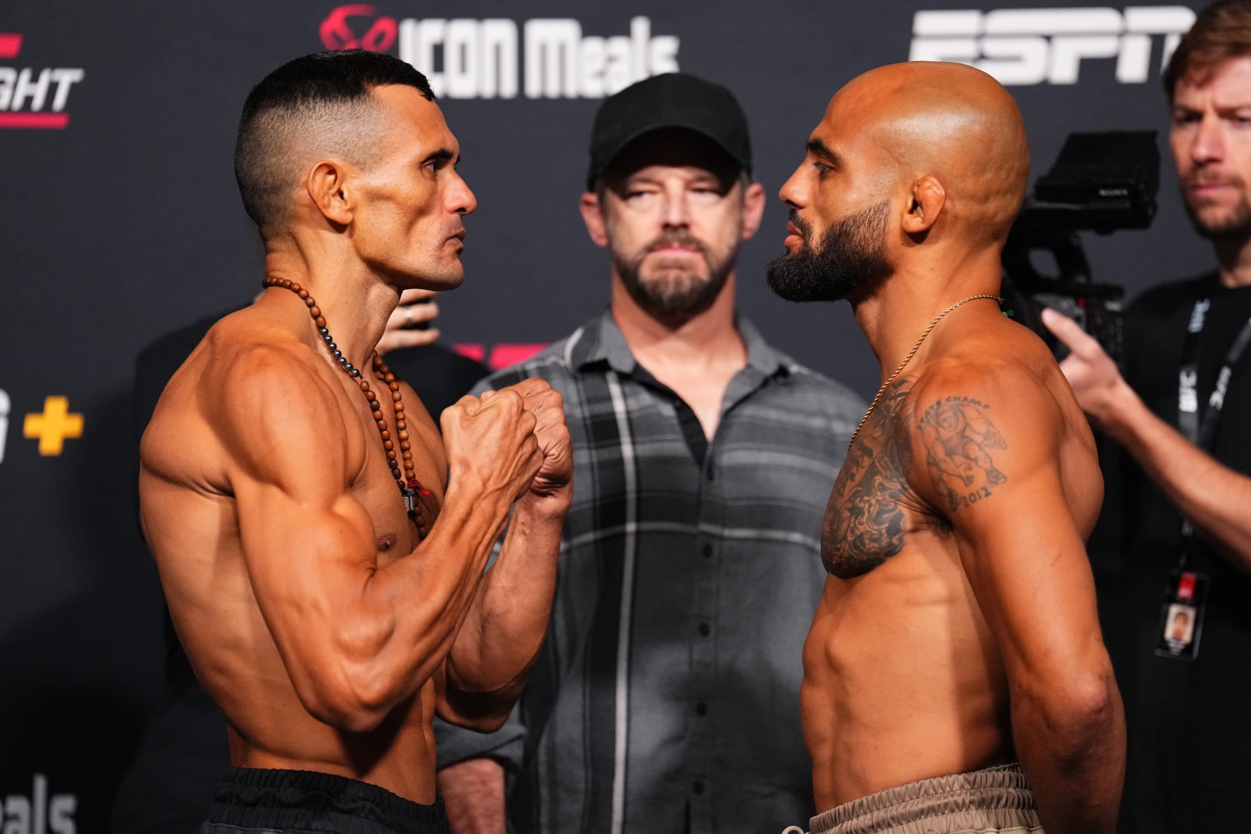 LAS VEGAS, NEVADA - JUNE 14: (L-R) Opponents Douglas Silva de Andrade of Brazil and Miles Johns face off during the UFC Fight Night weigh-in at UFC APEX on June 14, 2024 in Las Vegas, Nevada. (Photo by Chris Unger/Zuffa LLC via Getty Images)