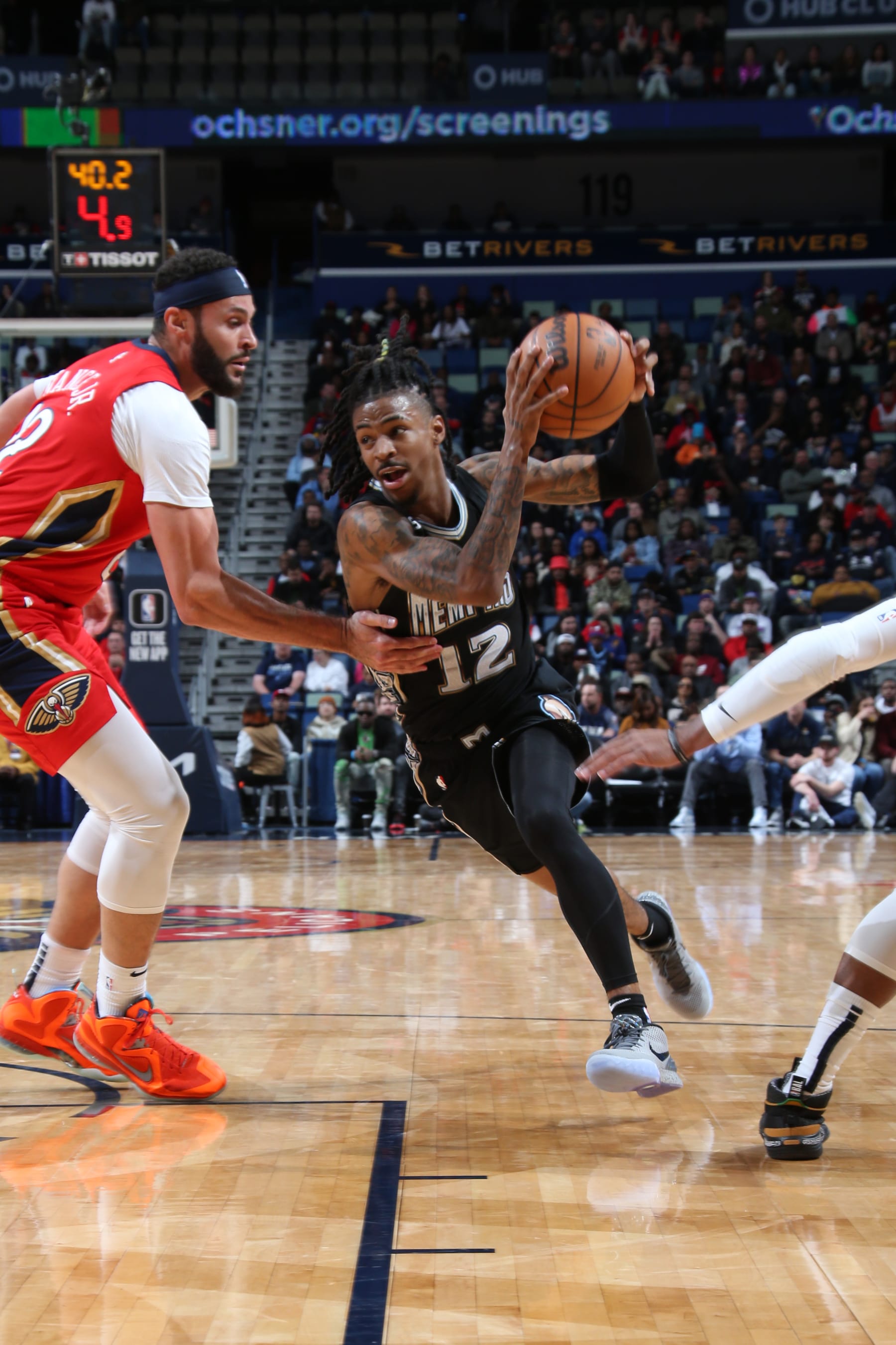 NEW ORLEANS, LA - NOVEMBER 15: Ja Morant #12 of the Memphis Grizzlies drives to the basket during the game against the New Orleans Pelicans on November 15, 2022 at the Smoothie King Center in New Orleans, Louisiana. NOTE TO USER: User expressly acknowledges and agrees that, by downloading and or using this Photograph, user is consenting to the terms and conditions of the Getty Images License Agreement. Mandatory Copyright Notice: Copyright 2022 NBAE (Photo by Layne Murdoch Jr./NBAE via Getty Images)
