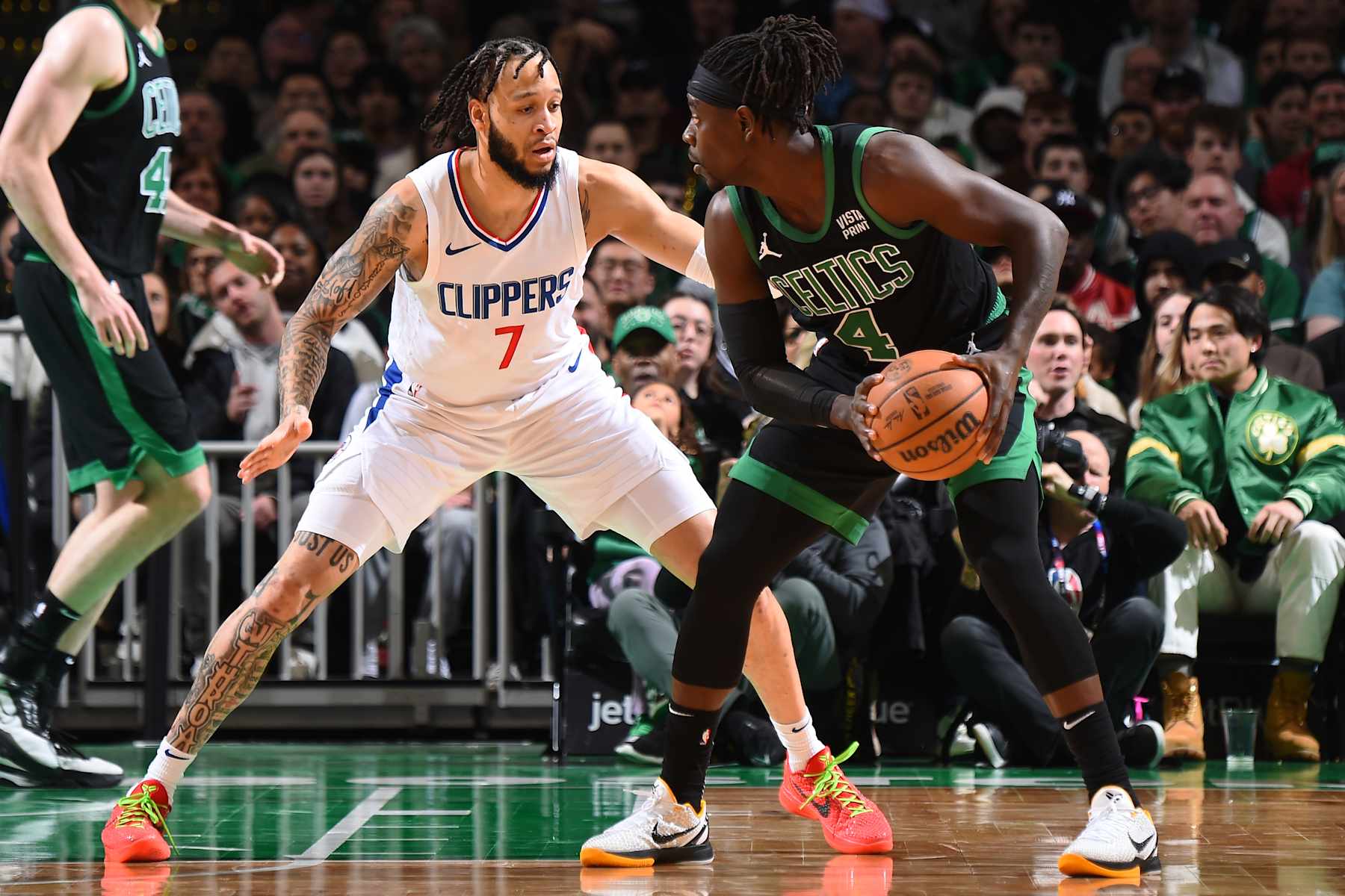 BOSTON, MA - JANUARY 27: Amir Coffey #7 of the LA Clippers plays defense during the game against the Boston Celtics on January 27, 2024 at the TD Garden in Boston, Massachusetts. NOTE TO USER: User expressly acknowledges and agrees that, by downloading and or using this photograph, User is consenting to the terms and conditions of the Getty Images License Agreement. Mandatory Copyright Notice: Copyright 2024 NBAE  (Photo by Brian Babineau/NBAE via Getty Images)