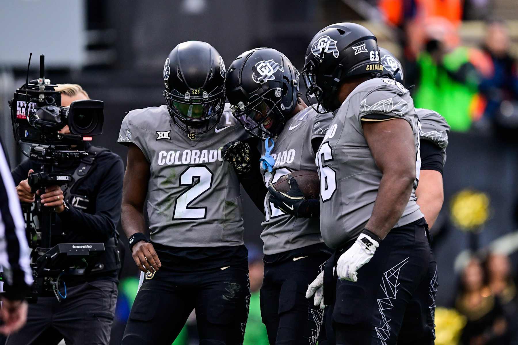 Colorado's Shedeur Sanders (2) and Travis Hunter (12)