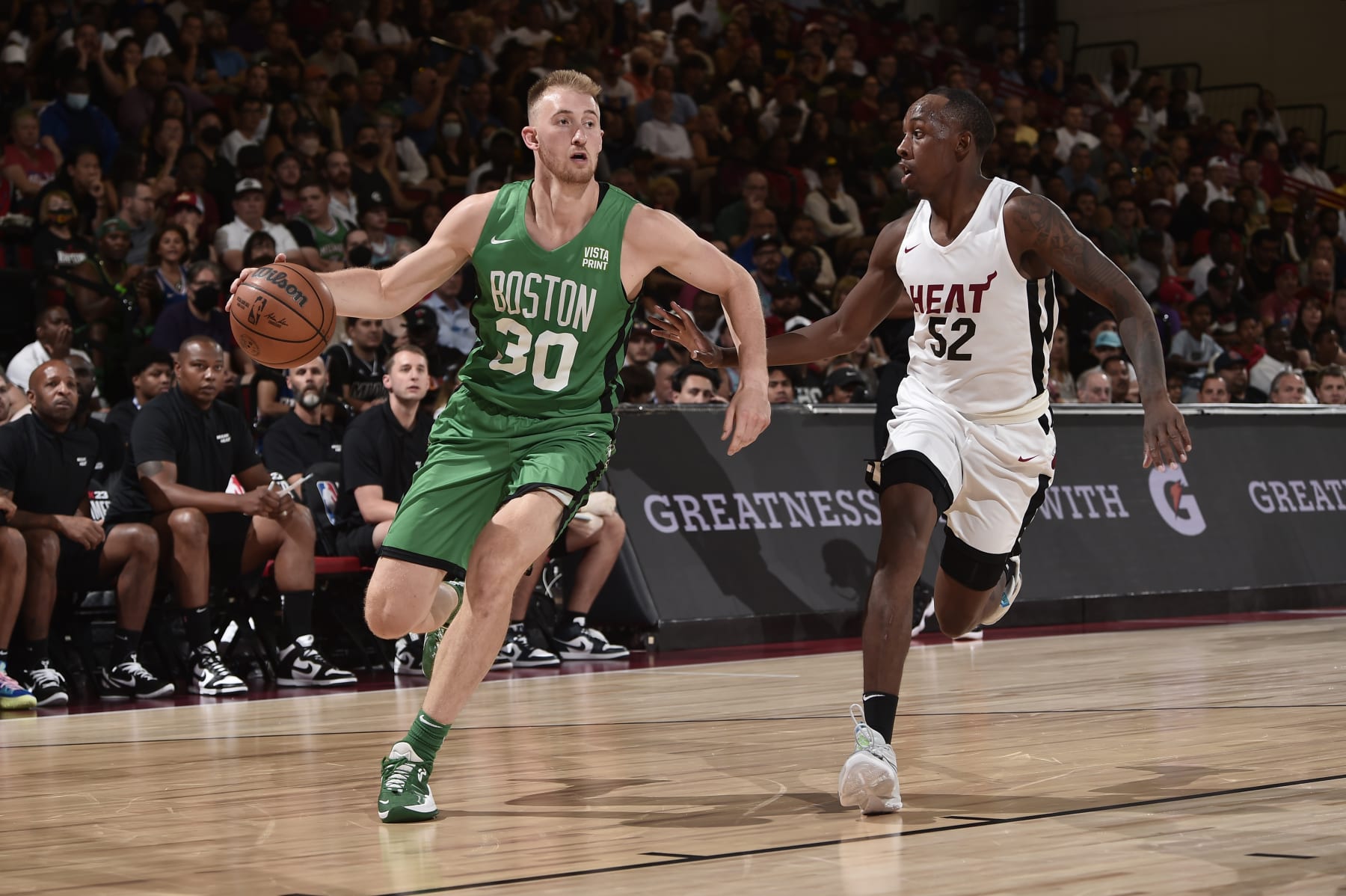 LAS VEGAS, NV - JULY 9: Sam Hauser #30 of the Boston Celtics drives to the basket during the game against the Miami Heat during the 2022 NBA Summer League on July 9, 2022 at the Cox Pavilion in Las Vegas, Nevada. NOTE TO USER: User expressly acknowledges and agrees that, by downloading and/or using this Photograph, user is consenting to the terms and conditions of the Getty Images License Agreement. Mandatory Copyright Notice: Copyright 2022 NBAE (Photo by David Dow/NBAE via Getty Images)