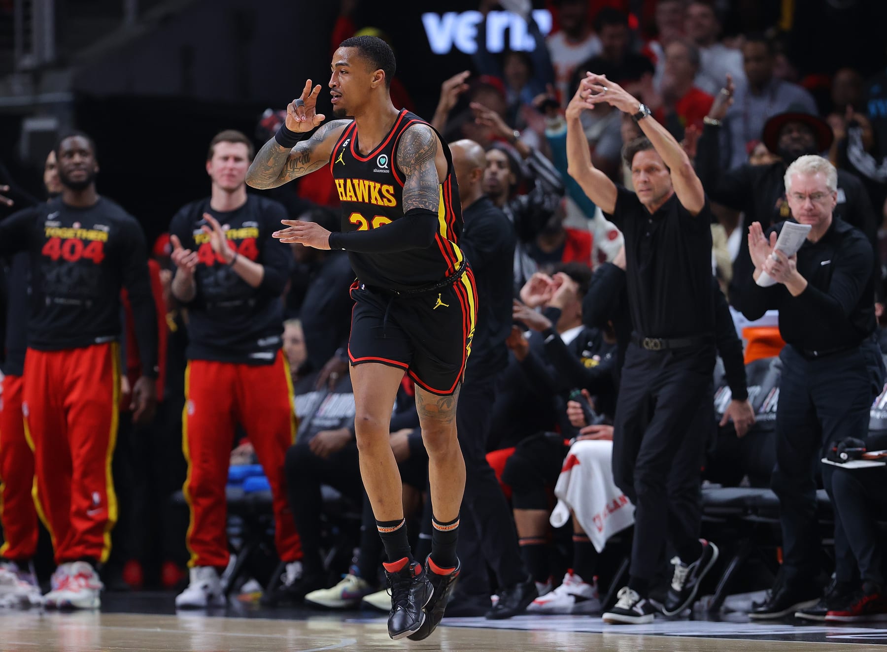 ATLANTA, GEORGIA - APRIL 27:  John Collins #20 of the Atlanta Hawks reacts after hitting a three-point basket against the Boston Celtics during the second quarter of Game Six of the Eastern Conference First Round Playoffs at State Farm Arena on April 27, 2023 in Atlanta, Georgia.  NOTE TO USER: User expressly acknowledges and agrees that, by downloading and or using this photograph, User is consenting to the terms and conditions of the Getty Images License Agreement.  (Photo by Kevin C. Cox/Getty Images)