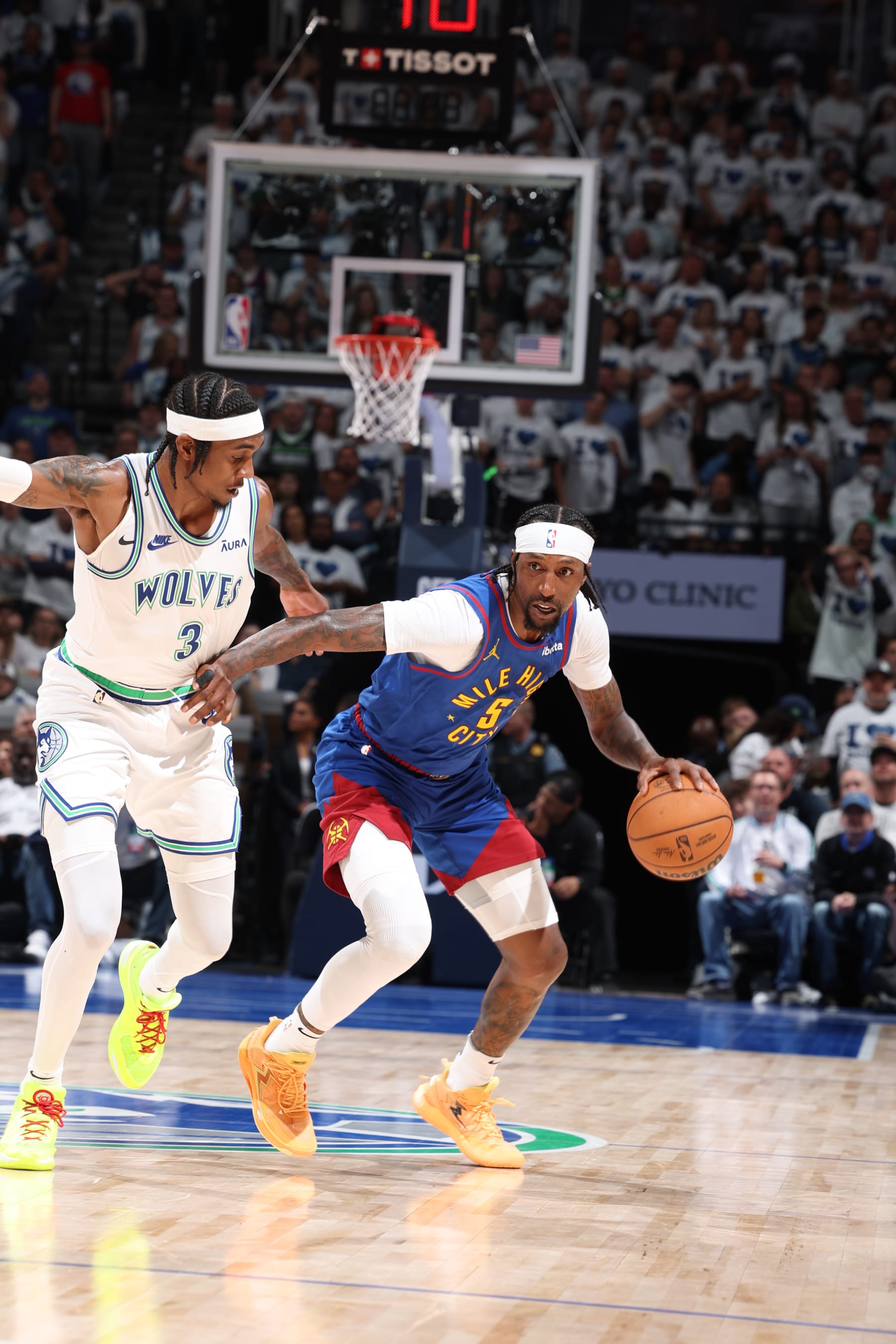 MINNEAPOLIS, MN - MAY 16: Kentavious Caldwell-Pope #5 of the Denver Nuggets handles the ball during the game against the Minnesota Timberwolves during Round 2 Game 6 of the 2024 NBA Playoffs on May 16, 2024 at Target Center in Minneapolis, Minnesota. NOTE TO USER: User expressly acknowledges and agrees that, by downloading and or using this Photograph, user is consenting to the terms and conditions of the Getty Images License Agreement. Mandatory Copyright Notice: Copyright 2024 NBAE (Photo by David Sherman/NBAE via Getty Images)