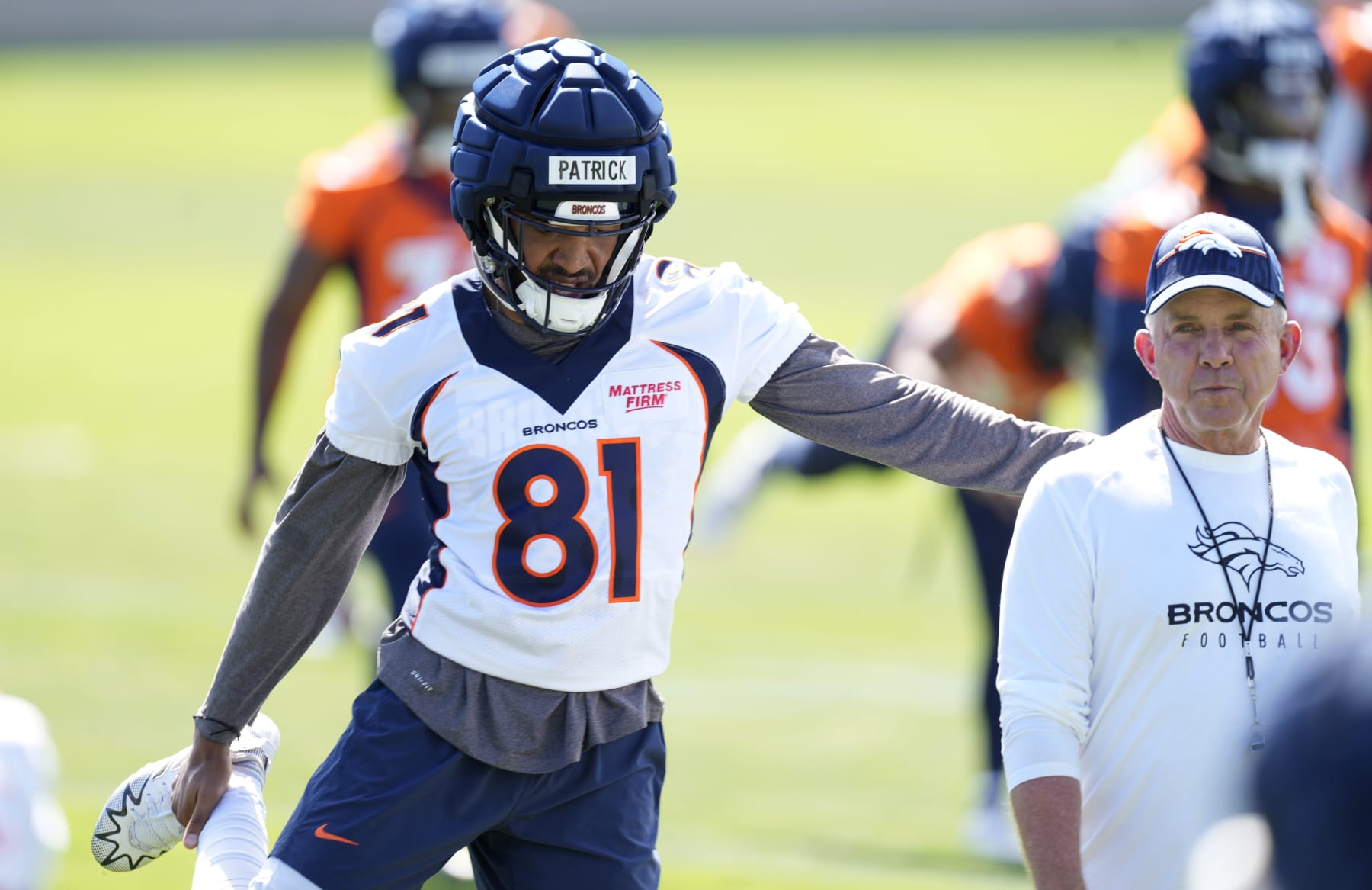 Denver Broncos wide receiver Tim Patrick (left) and head coach Sean Payton (right)