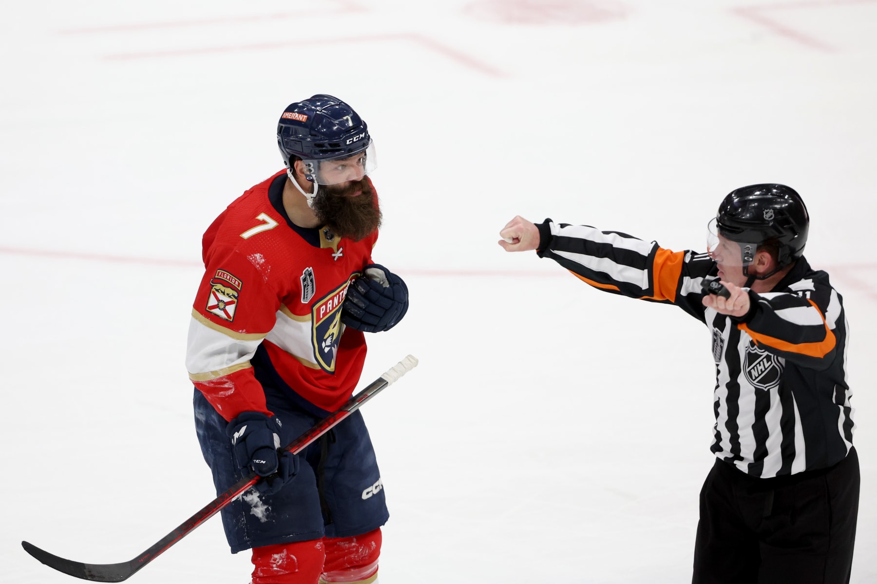 SUNRISE, FLORIDA - JUNE 08:  Radko Gudas #7 of the Florida Panthers reacts after he is called for a roughing penalty against the Vegas Golden Knights by referee Kelly Sutherland #11 during the first period in Game Three of the 2023 NHL Stanley Cup Final at FLA Live Arena on June 08, 2023 in Sunrise, Florida. (Photo by Patrick Smith/Getty Images)
