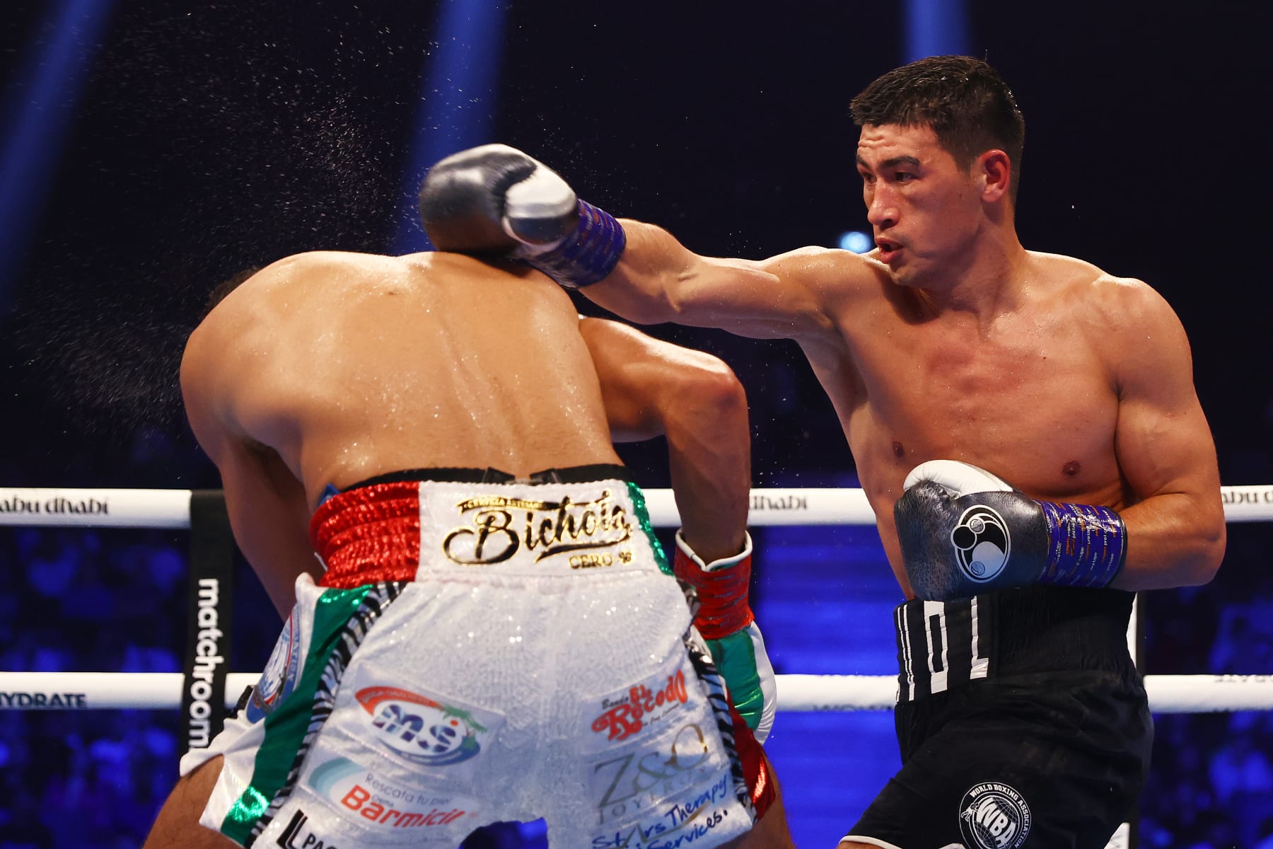 ABU DHABI, UNITED ARAB EMIRATES - NOVEMBER 05: Dmitrill Bivol punches Gilberto Ramirez during the WBA Super World Light Heavyweight Title fight between Dmitrii Bivol and Gilberto Ramirez at Etihad Arena on November 05, 2022 in Abu Dhabi, United Arab Emirates. (Photo by Francois Nel/Getty Images)