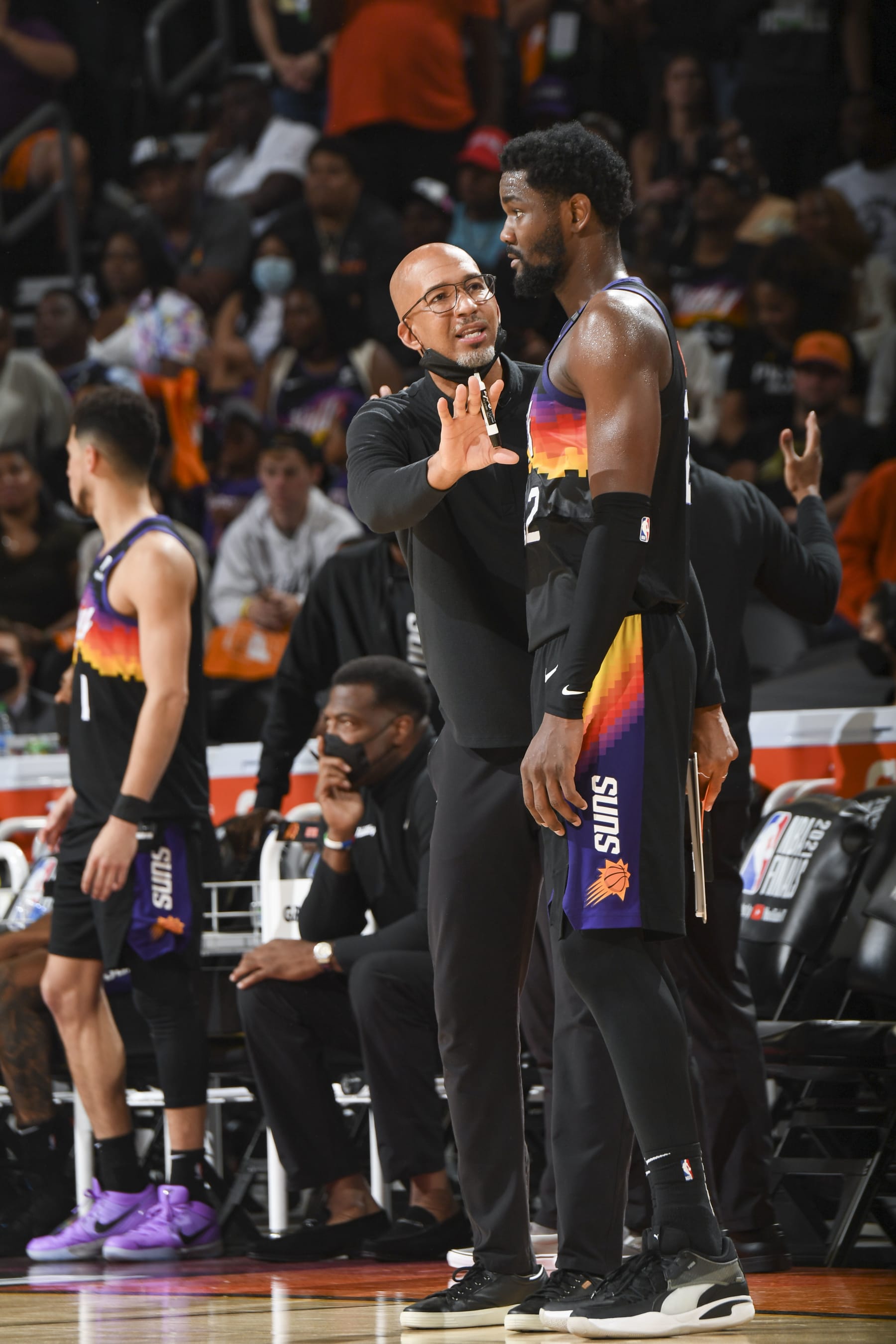PHOENIX, AZ - JULY 8: Head Coach Monty Williams of the Phoenix Suns talks to Deandre Ayton #22 of the Phoenix Suns during the game against the Milwaukee Bucks during Game Two of the 2021 NBA Finals on July 8, 2021 at Phoenix Suns Arena in Phoenix, Arizona. NOTE TO USER: User expressly acknowledges and agrees that, by downloading and or using this photograph, user is consenting to the terms and conditions of the Getty Images License Agreement. Mandatory Copyright Notice: Copyright 2021 NBAE (Photo by Andrew D. Bernstein/NBAE via Getty Images)