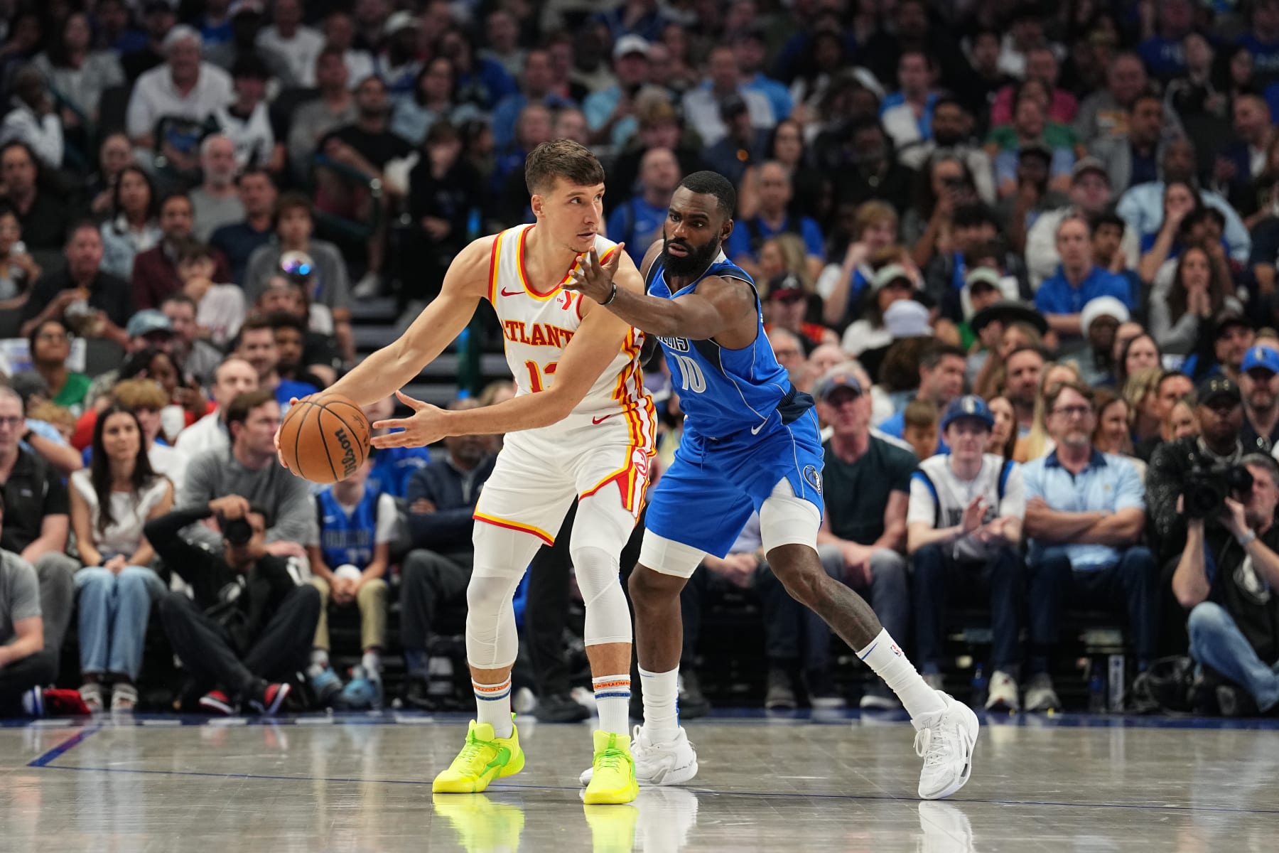 DALLAS, TX - APRIL 4: Tim Hardaway Jr. #10 of the Dallas Mavericks plays defense during the game  against Bogdan Bogdanovic #13 of the Atlanta Hawks on April 4, 2024 at the American Airlines Center in Dallas, Texas. NOTE TO USER: User expressly acknowledges and agrees that, by downloading and or using this photograph, User is consenting to the terms and conditions of the Getty Images License Agreement. Mandatory Copyright Notice: Copyright 2024 NBAE (Photo by Glenn James/NBAE via Getty Images)