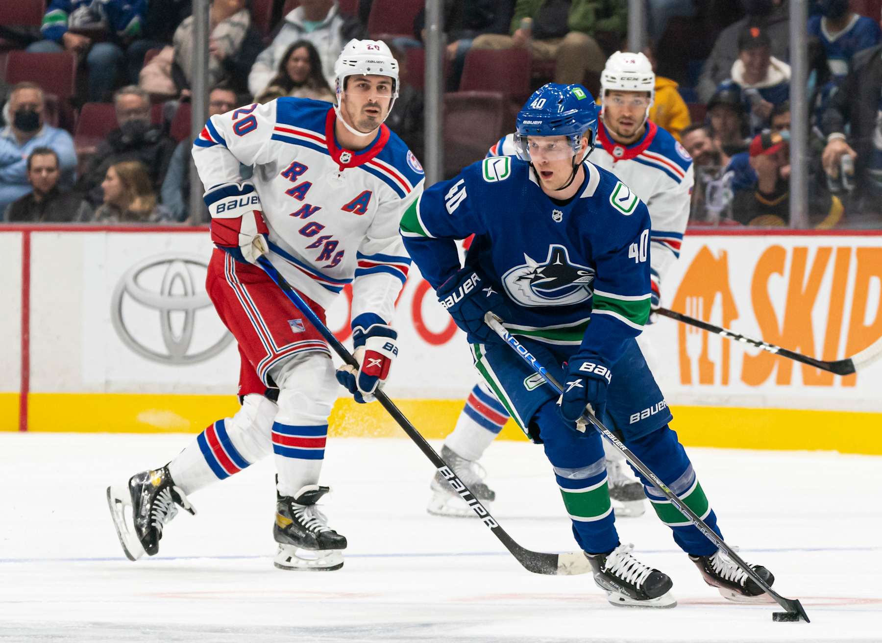 Chris Kreider and Elias Pettersson.