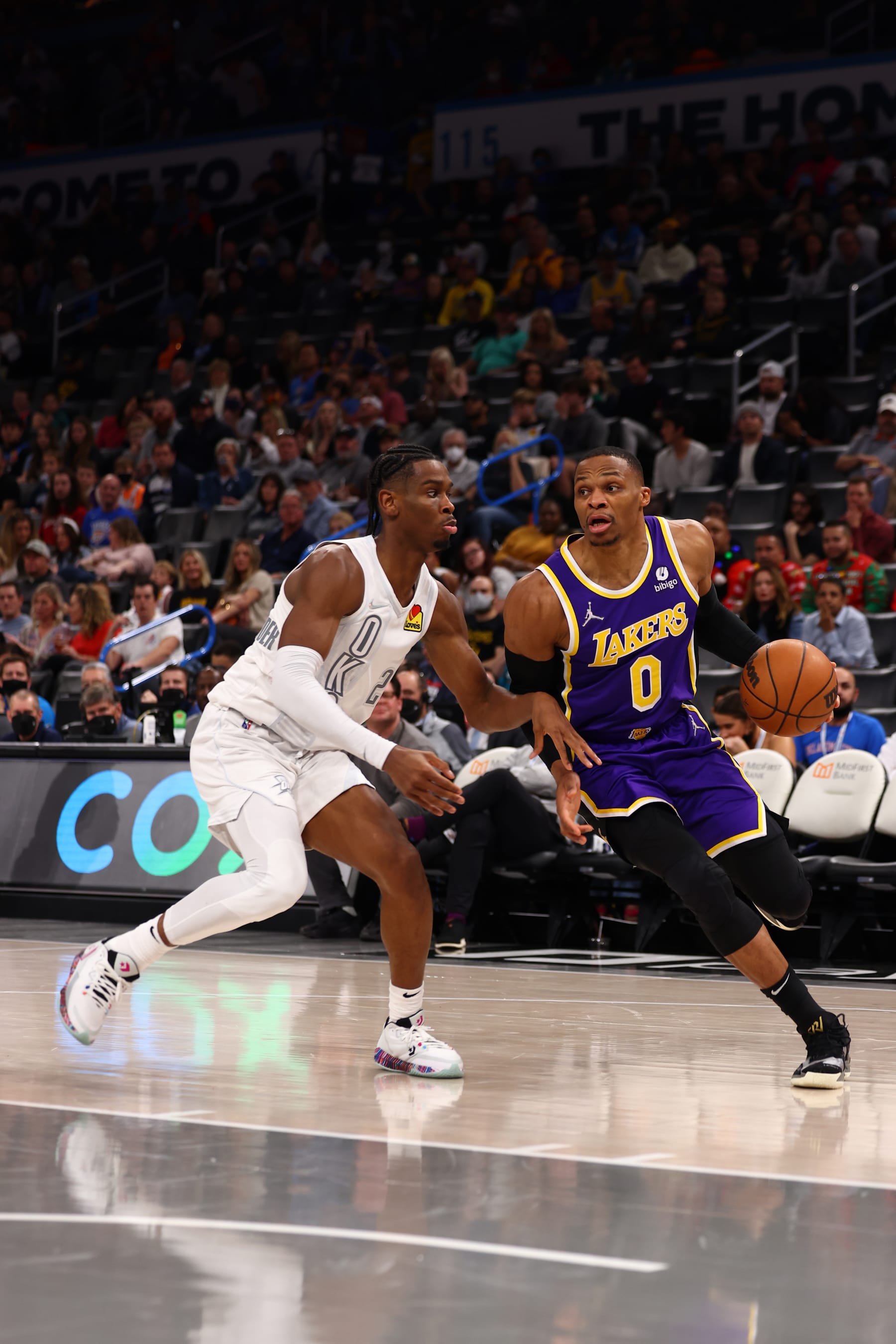 OKLAHOMA CITY, OK - DECEMBER 10: Russell Westbrook #0 of the Los Angeles Lakers dribbles the ball during the game against the Oklahoma City Thunder on December 10, 2021 at Paycom Arena in Oklahoma City, Oklahoma. NOTE TO USER: User expressly acknowledges and agrees that, by downloading and or using this photograph, User is consenting to the terms and conditions of the Getty Images License Agreement. Mandatory Copyright Notice: Copyright 2021 NBAE (Photo by Zach Beeker/NBAE via Getty Images)