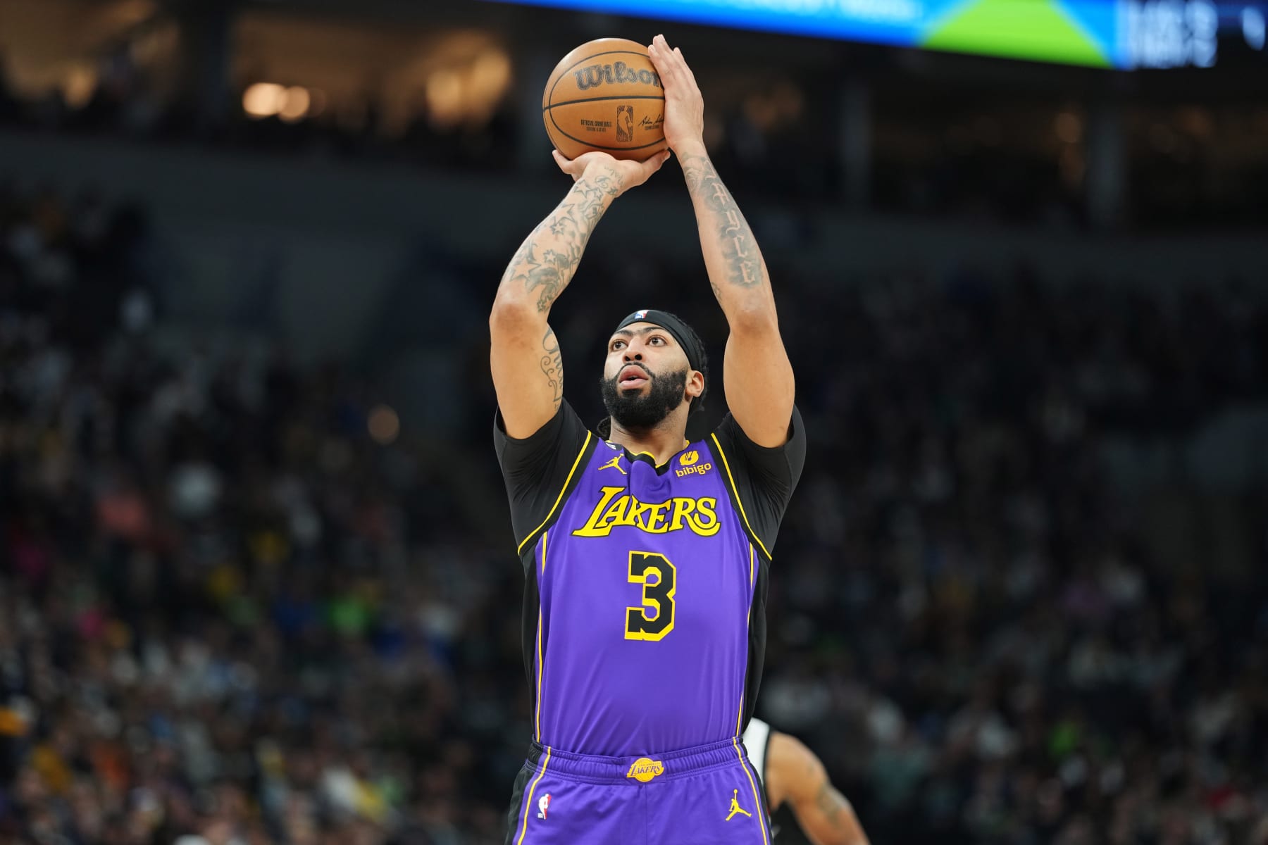 MINNEAPOLIS, MN -  MARCH 31: Anthony Davis #3 of the Los Angeles Lakers shoots a free throw during the game against the Minnesota Timberwolves on March 31, 2023 at Target Center in Minneapolis, Minnesota. NOTE TO USER: User expressly acknowledges and agrees that, by downloading and or using this Photograph, user is consenting to the terms and conditions of the Getty Images License Agreement. Mandatory Copyright Notice: Copyright 2023 NBAE (Photo by Jordan Johnson/NBAE via Getty Images)