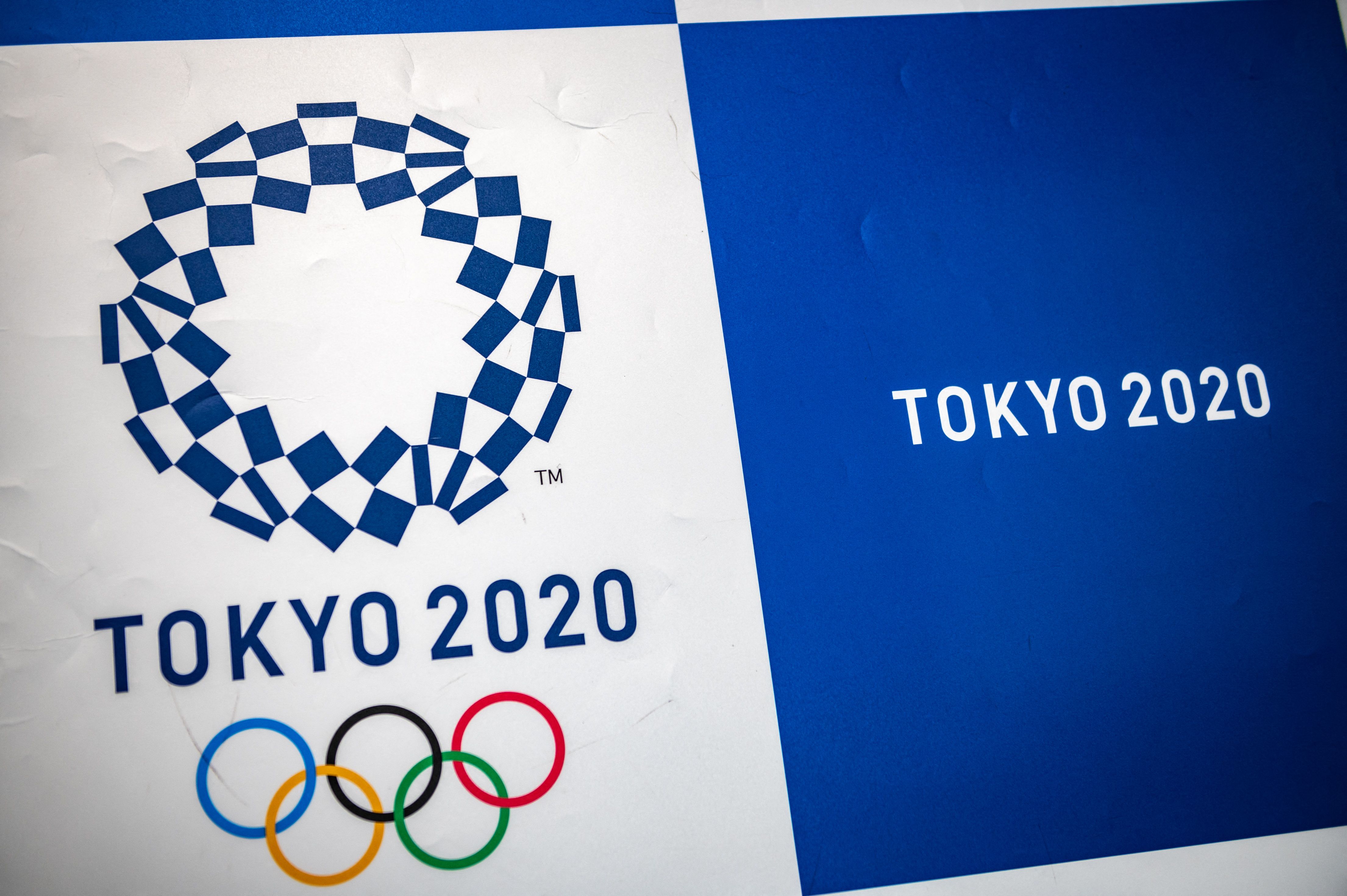 This picture shows the Tokyo 2020 Olympic Games logo at the office of the Tokyo 2020 Organising Committee of the Olympic and Paralympic Games in Tokyo on April 30, 2021. (Photo by Philip FONG / AFP) (Photo by PHILIP FONG/AFP via Getty Images)