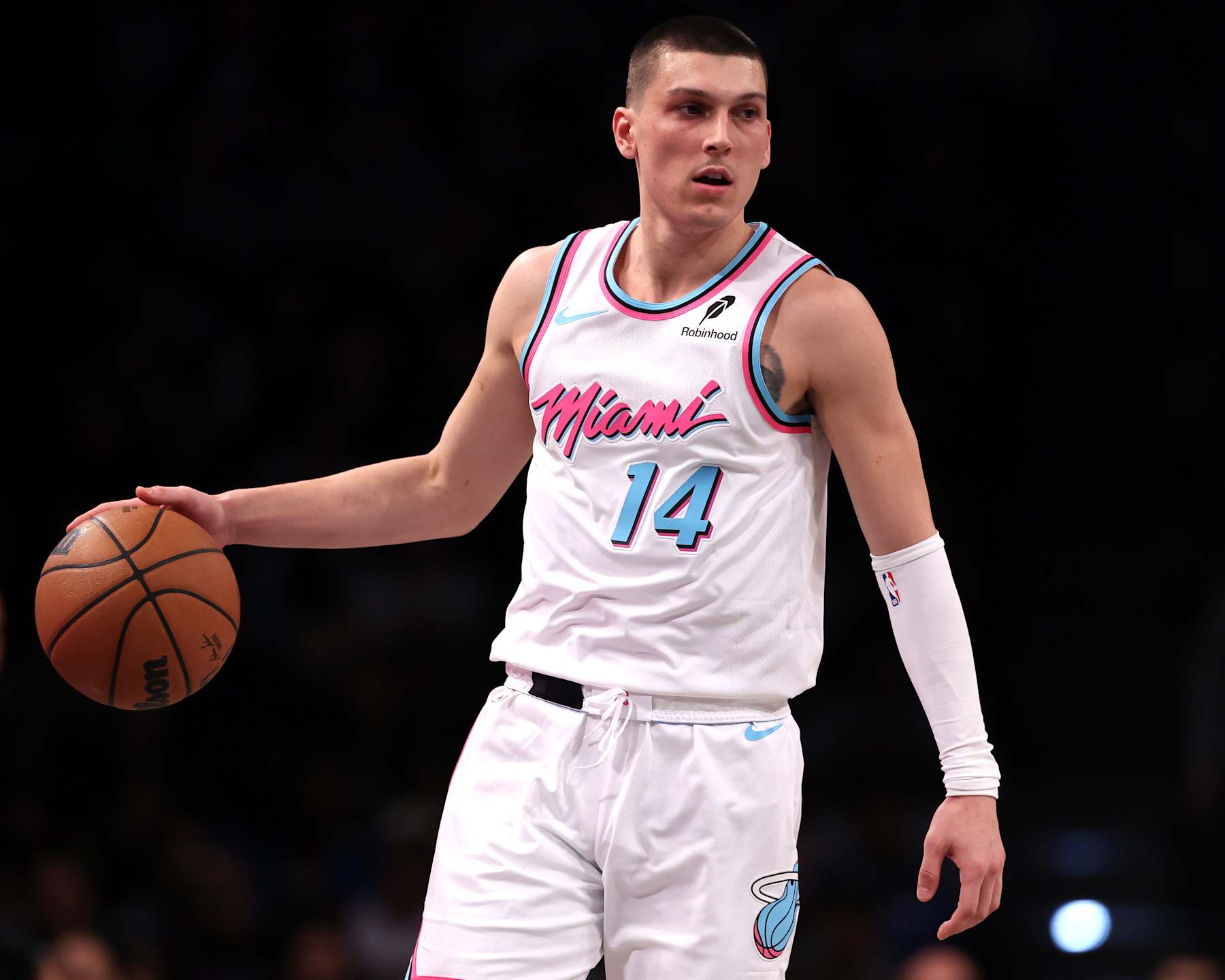 NEW YORK, NEW YORK - JANUARY 25: Tyler Herro #14 of the Miami Heat dribbles the ball during the second half against the Brooklyn Nets at Barclays Center on January 25, 2025 in New York City. NOTE TO USER: User expressly acknowledges and agrees that, by downloading and or using this photograph, User is consenting to the terms and conditions of the Getty Images License Agreement. (Photo by Jordan Bank/Getty Images)