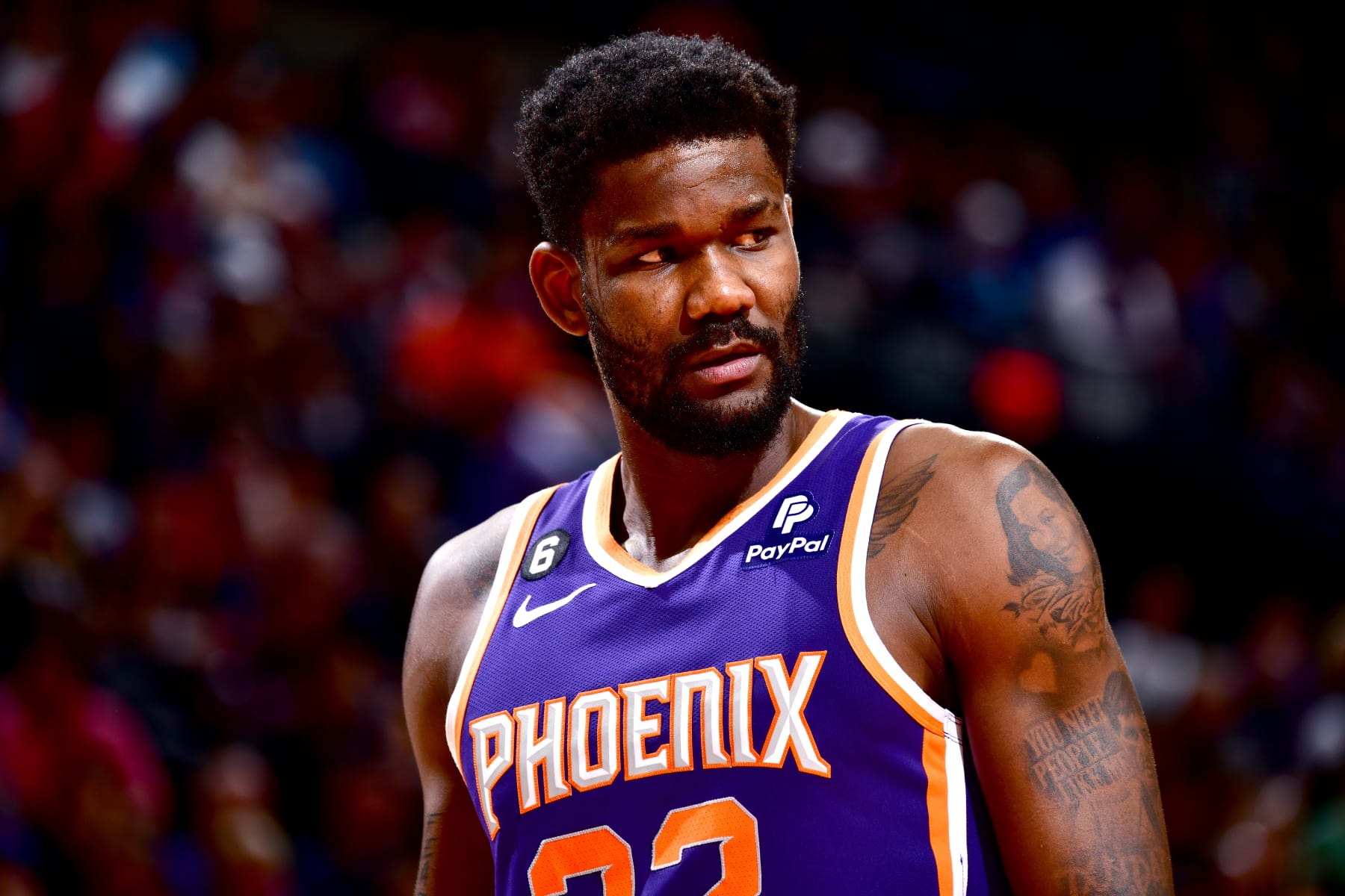 PHOENIX, AZ - MARCH 8:  Deandre Ayton #22 of the Phoenix Suns looks on during the game against the Oklahoma City Thunder on March 8, 2023 at Footprint Center in Phoenix, Arizona. NOTE TO USER: User expressly acknowledges and agrees that, by downloading and or using this photograph, user is consenting to the terms and conditions of the Getty Images License Agreement. Mandatory Copyright Notice: Copyright 2023 NBAE (Photo by Barry Gossage/NBAE via Getty Images)