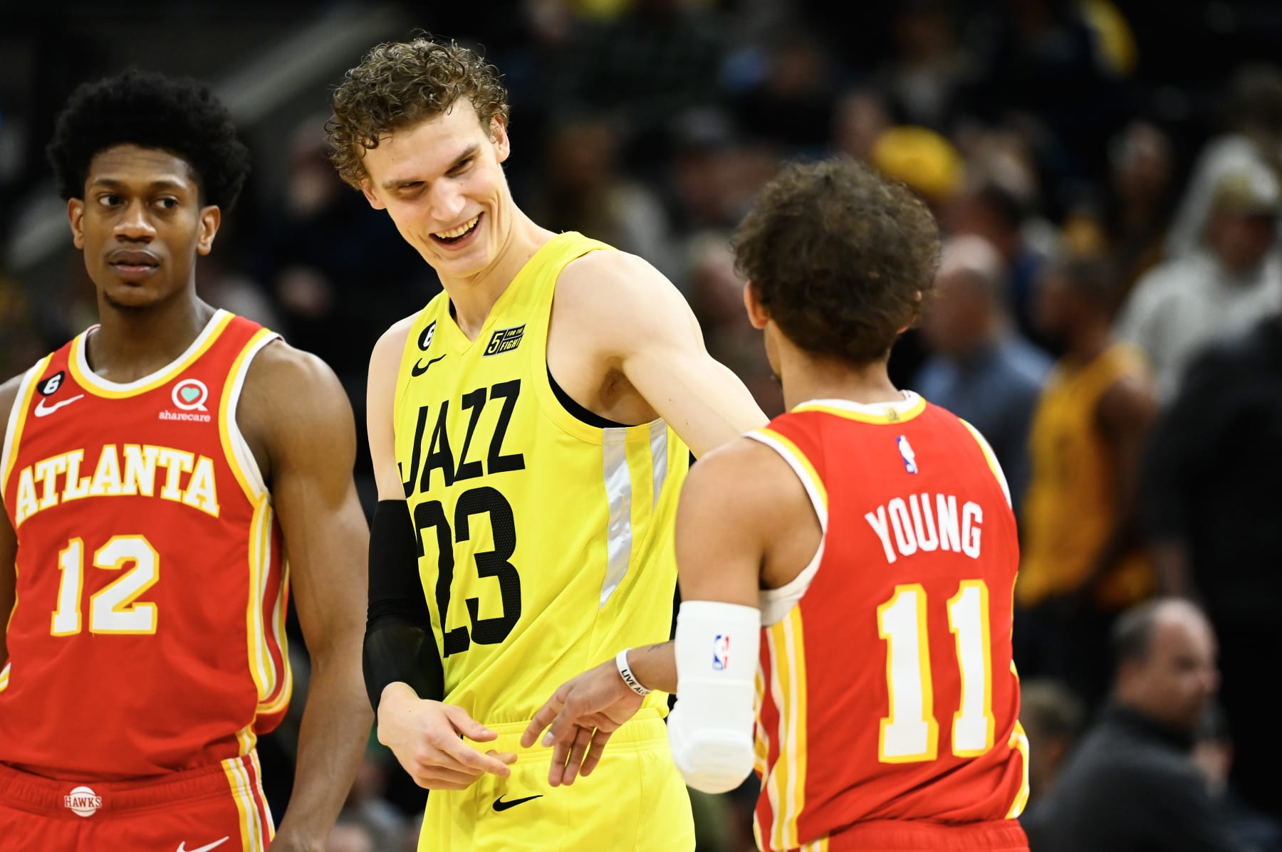 SALT LAKE CITY, UTAH - FEBRUARY 03: Lauri Markkanen #23 of the Utah Jazz speaks to Trae Young #11 of the Atlanta Hawks before a game at Vivint Arena on February 03, 2023 in Salt Lake City, Utah.  NOTE TO USER: User expressly acknowledges and agrees that, by downloading and or using this photograph, User is consenting to the terms and conditions of the Getty Images License Agreement. (Photo by Alex Goodlett/Getty Images)