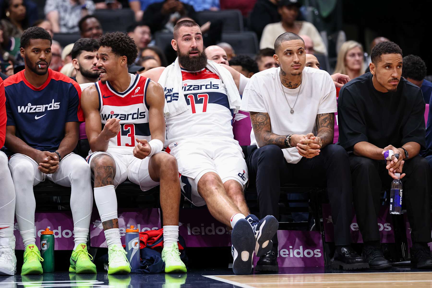 WASHINGTON, DC - OCTOBER 30: Jared Butler #4, Jordan Poole #13, Jonas Valanciunas #17, Kyle Kuzma #33, and Malcolm Brogdon #15 of the Washington Wizards look on from the bench during the second half against the Atlanta Hawks at Capital One Arena on October 30, 2024 in Washington, DC. NOTE TO USER: User expressly acknowledges and agrees that, by downloading and or using this photograph, User is consenting to the terms and conditions of the Getty Images License Agreement. (Photo by Scott Taetsch/Getty Images)