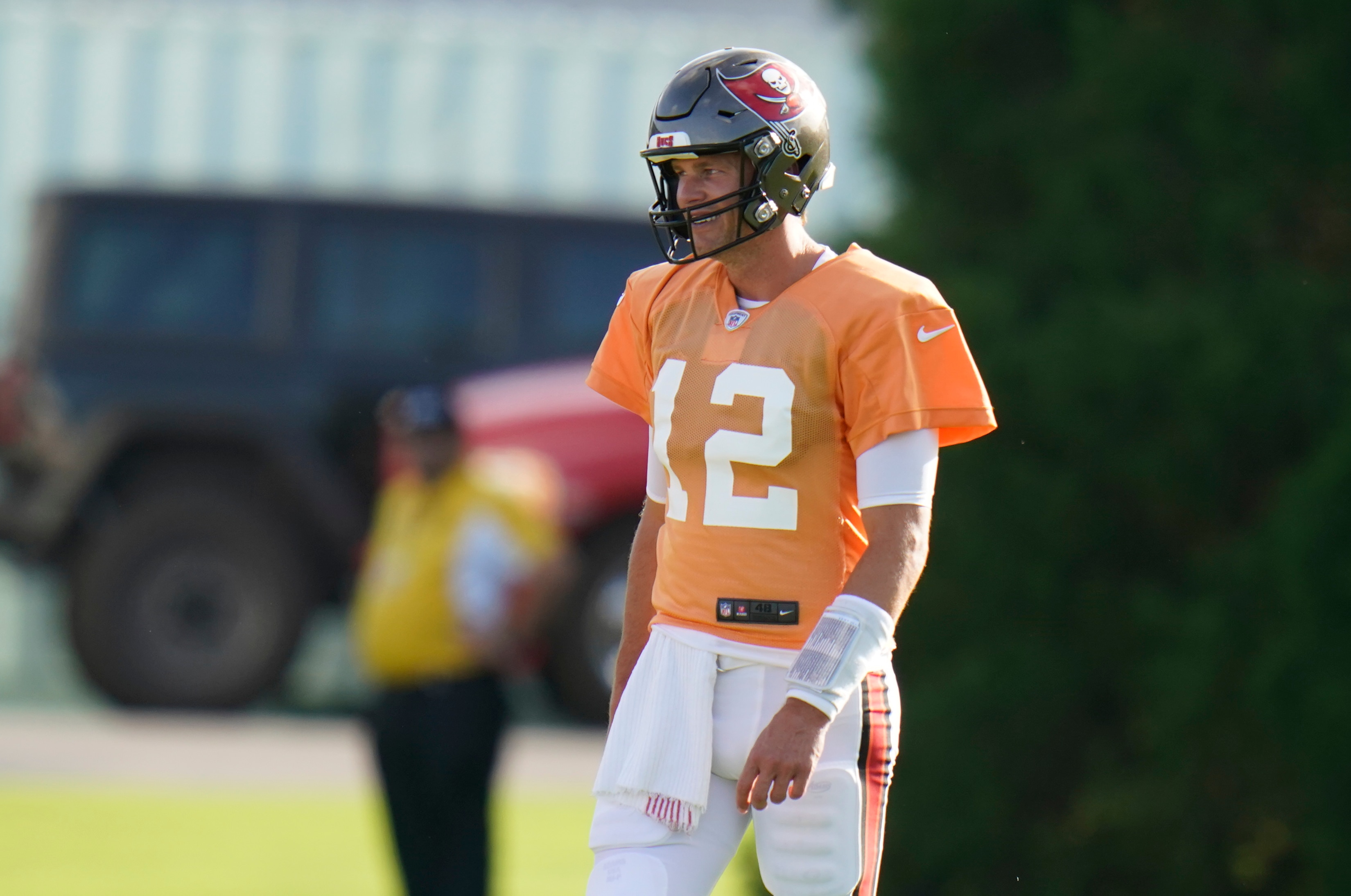Tampa Bay Buccaneers quarterback Tom Brady (12) during an NFL football practice Saturday, July 31, 2021, in Tampa, Fla. Teams league wide are taking part in Back together Saturday, which allows fans an upclose look at NFL training camps. (AP Photo/Chris O'Meara)