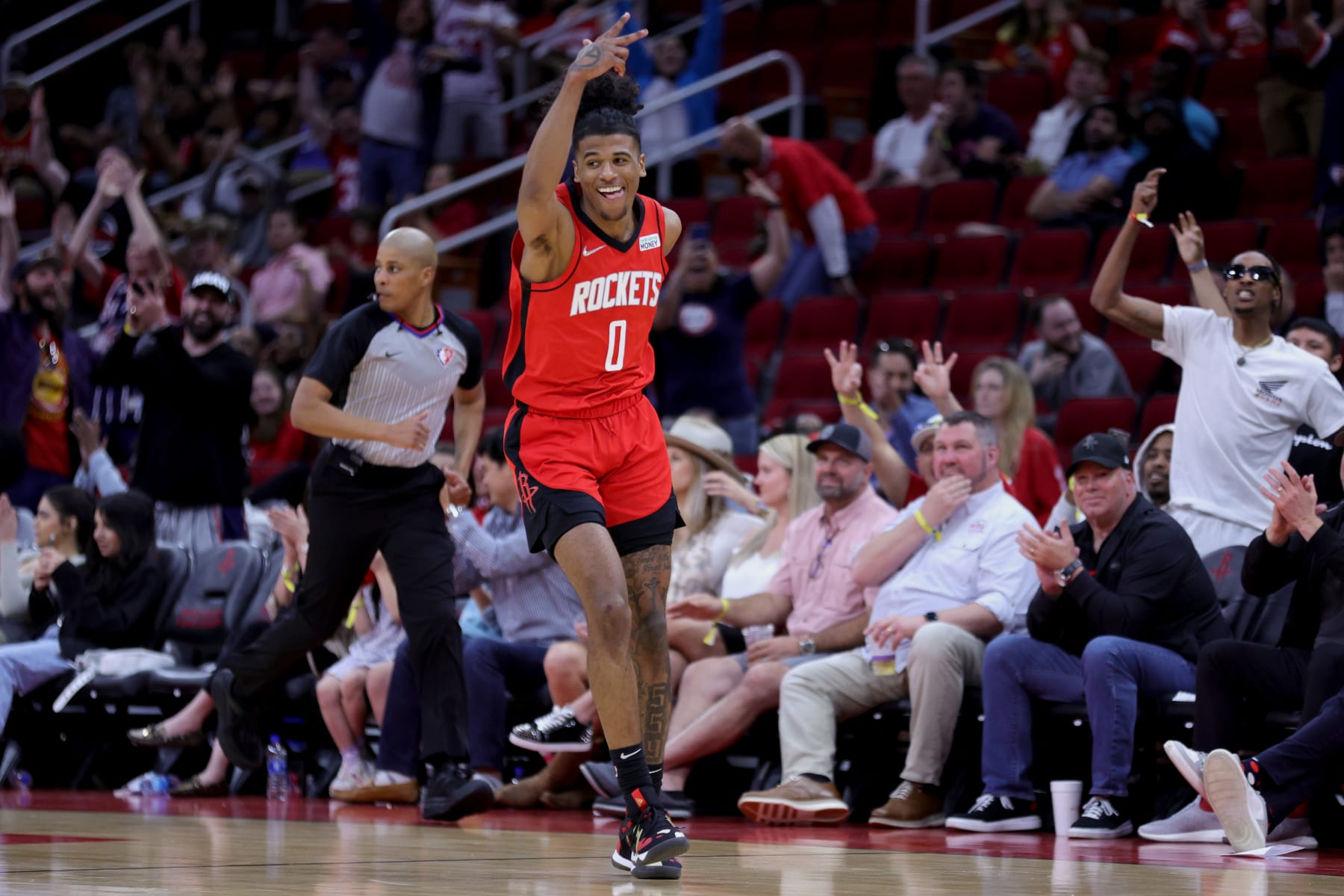 HOUSTON, TEXAS - APRIL 10: Jalen Green #0 of the Houston Rockets reacts to a three point basket against the Atlanta Hawks during the second half at Toyota Center on April 10, 2022 in Houston, Texas. NOTE TO USER: User expressly acknowledges and agrees that, by downloading and or using this photograph, User is consenting to the terms and conditions of the Getty Images License Agreement. (Photo by Carmen Mandato/Getty Images)