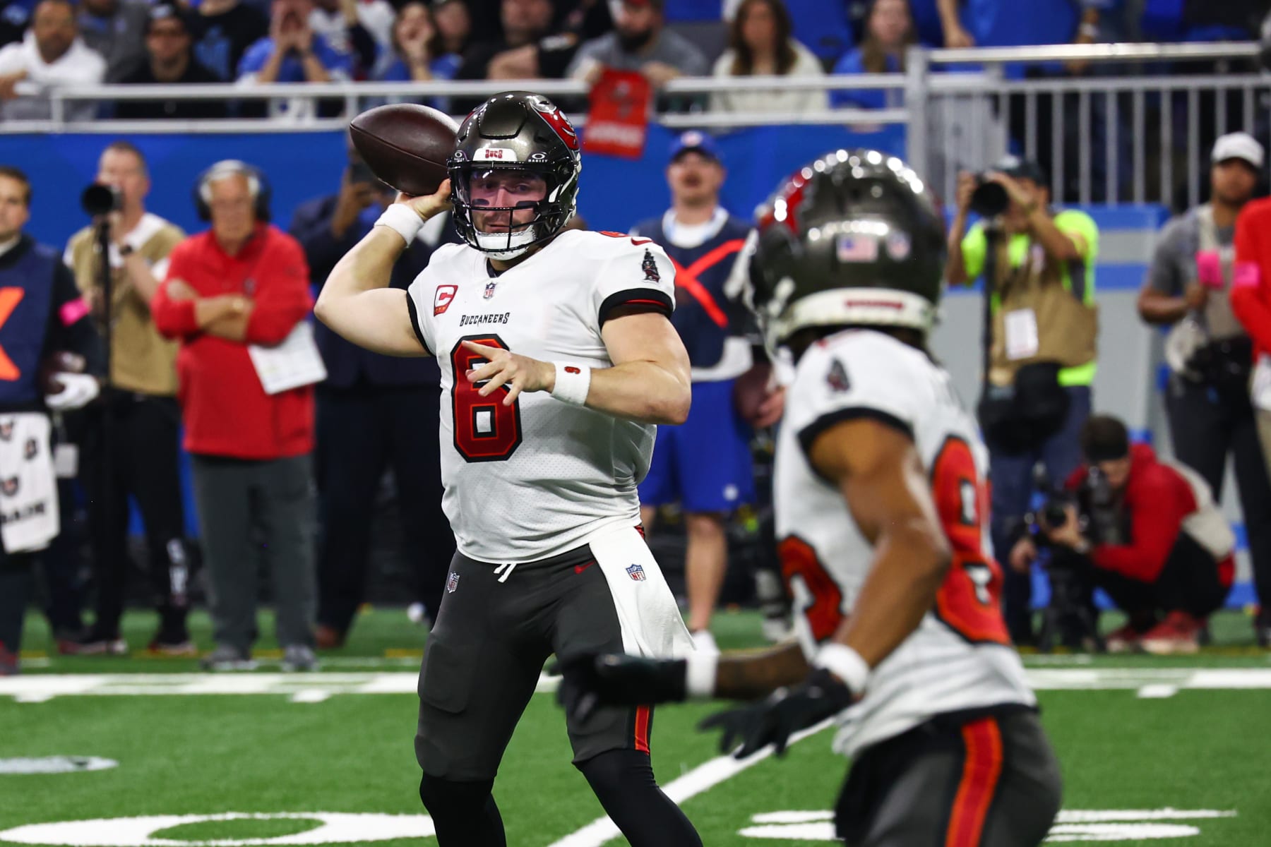 DETROIT, MI - JANUARY 21:  Tampa Bay Buccaneers quarterback Baker Mayfield (6) throws a pass during a play during an NFL NFC Divisional playoff football game between the Tampa Bay Buccaneers and the Detroit Lions on January 21, 2024 at Ford Field in Detroit, Michigan. (Photo by Scott W. Grau/Icon Sportswire via Getty Images)